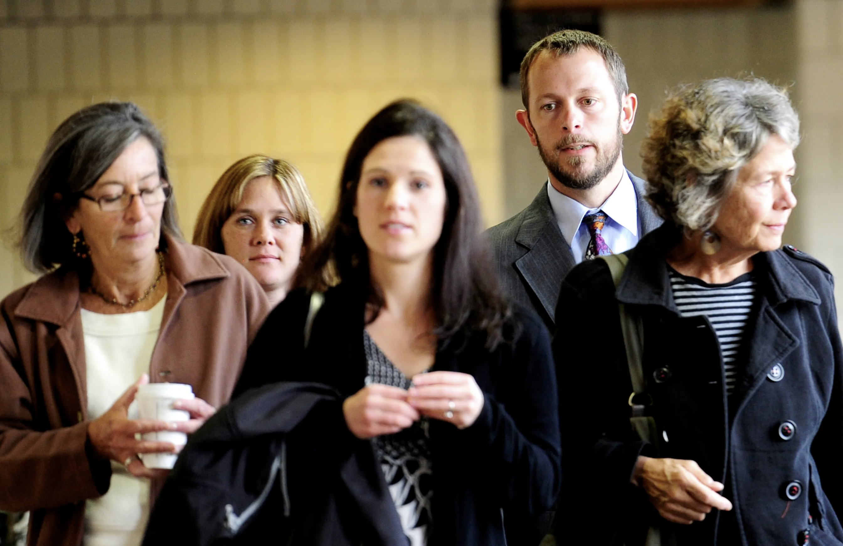 Michael Clark's family walked into court in 2012 for his murder trial. They are from left Colleen Clark, his mother, Heidi Flanagan, sister-in-law, Amy Clark, his wife, Clark, and Terry Gupp, his aunt. (Mark Leffingwell, The Daily Camera)
