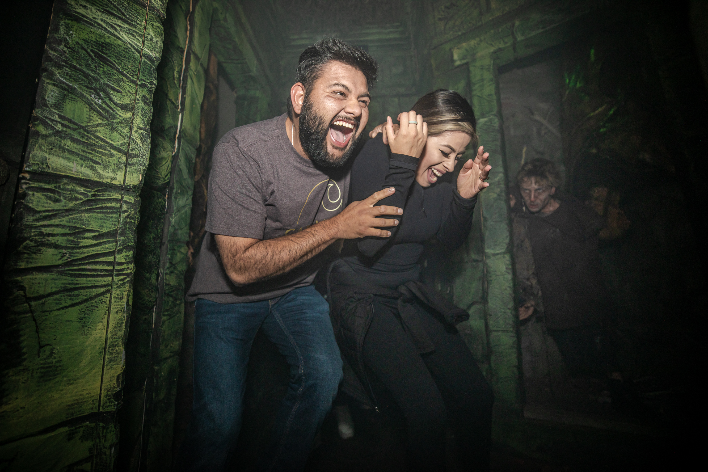 Visitors to the 13th Floor react to the frights in the haunted house. (Courtesy photo, 13th Floor)