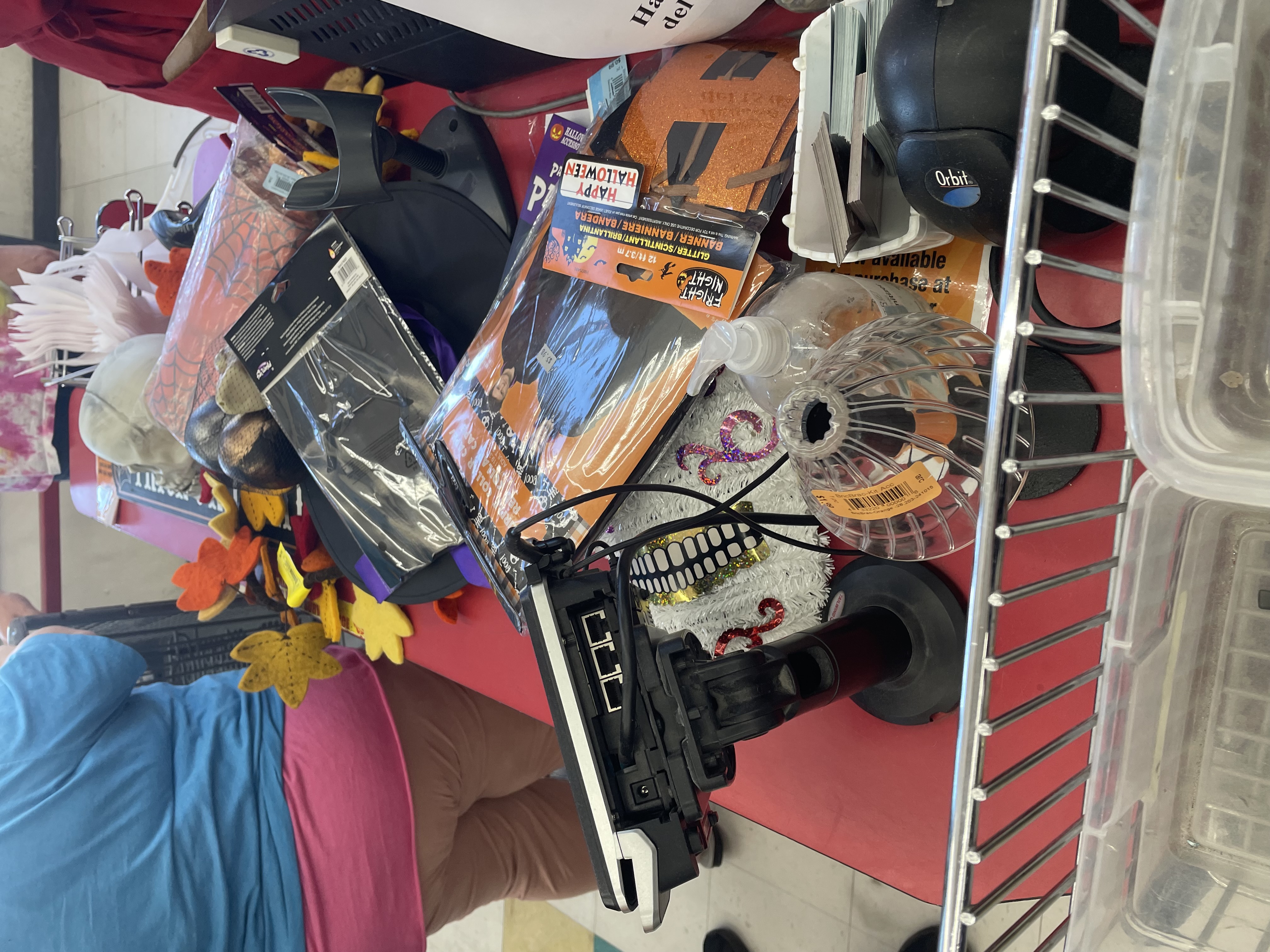 A crew of Halloween shoppers from Nostalgia Group piled their items in a shopping cart for a horror-comedy they are producing. The final bill was $39 even. (Carol McKinley)