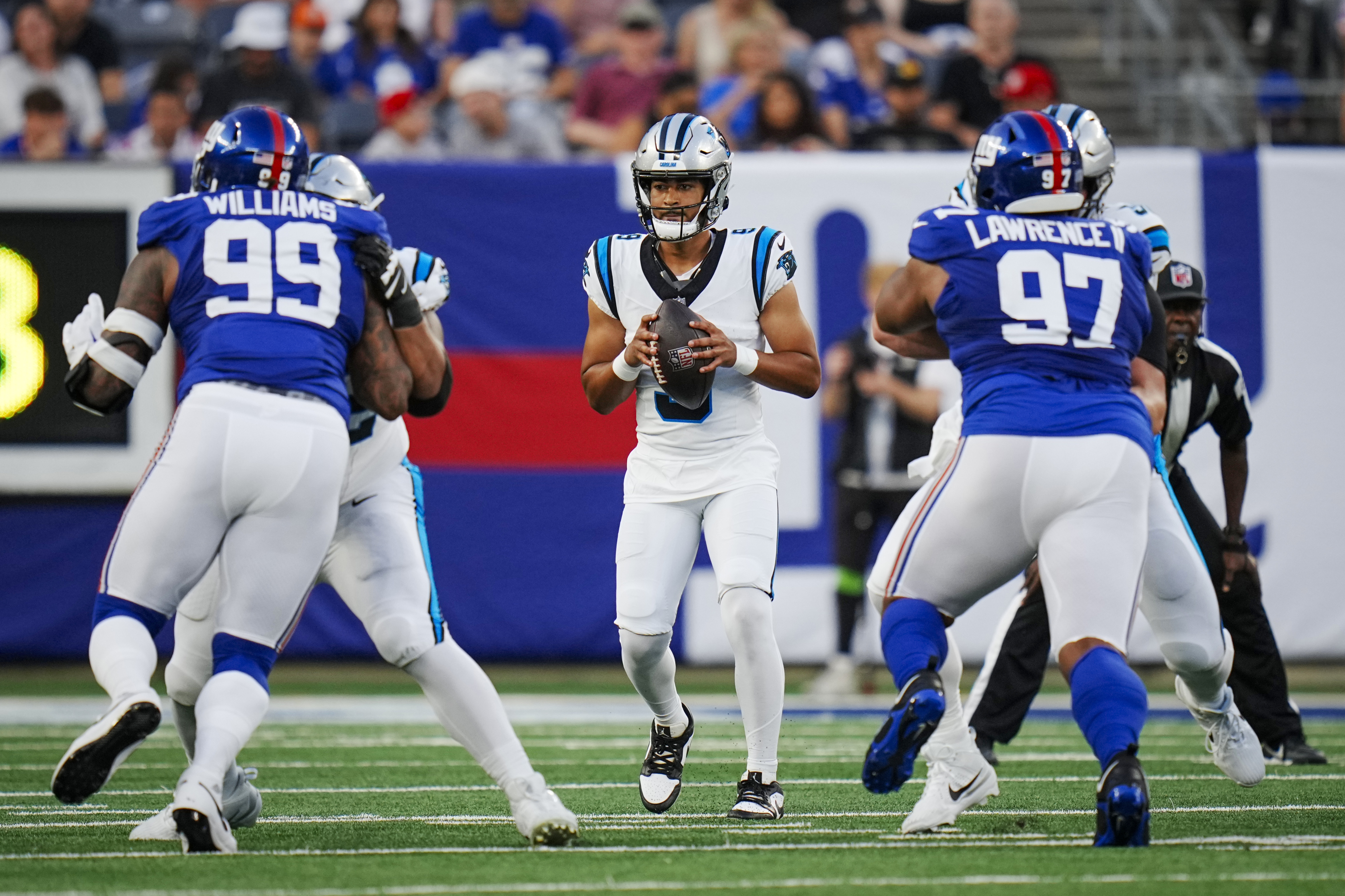 Broncos QB Zach Wilson has been willing to offer advice to embattled Panthers QB Bryce Young