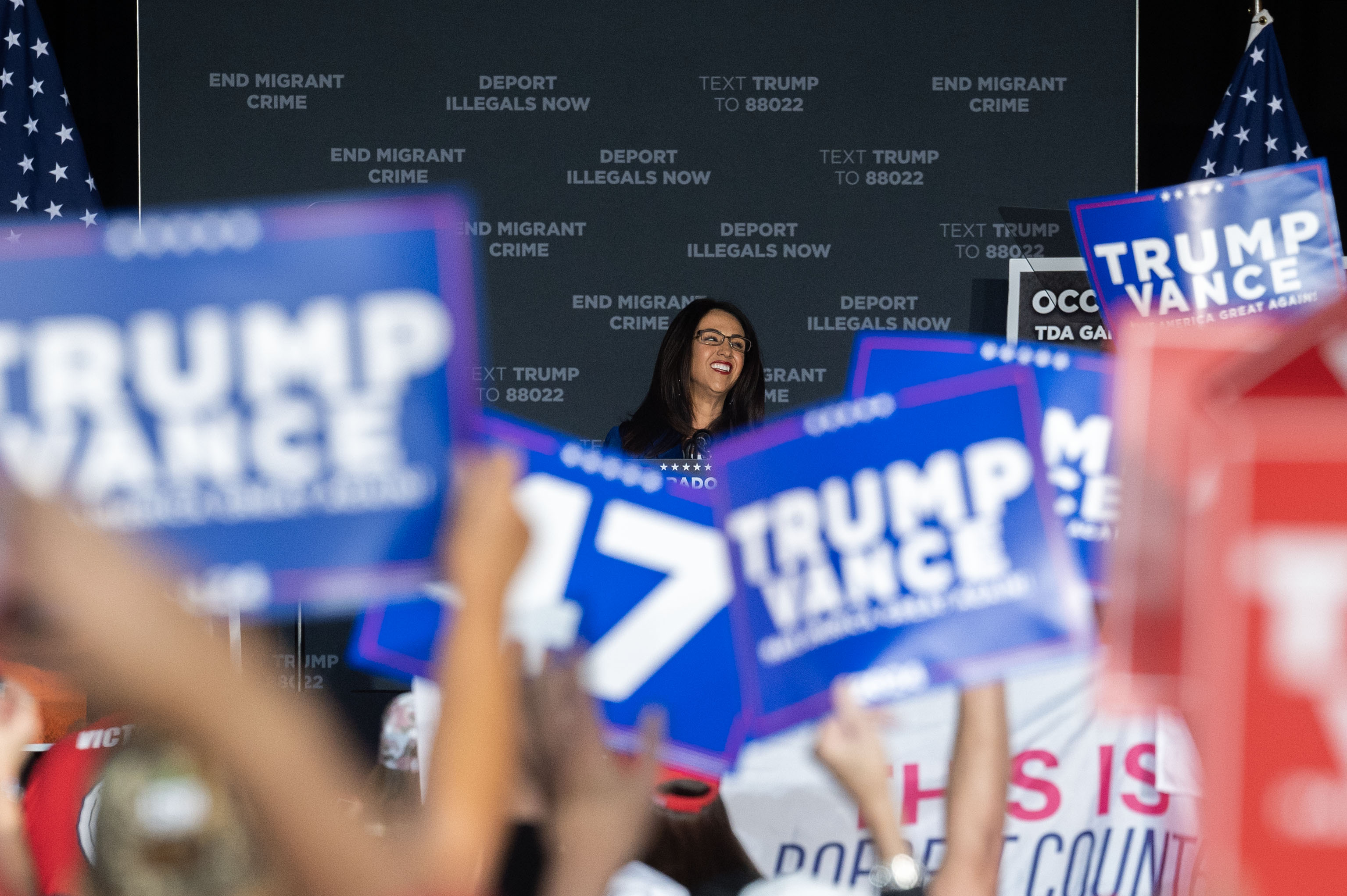 The crowd cheers as Lauren Boebert takes the stage during a trump rally at the Gaylord Rockies Resort and Convention Center in Aurora on Friday, Oct. 11, 2024. (Stephen Swofford, Denver Gazette) (Stephen Swofford Denver Gazette)