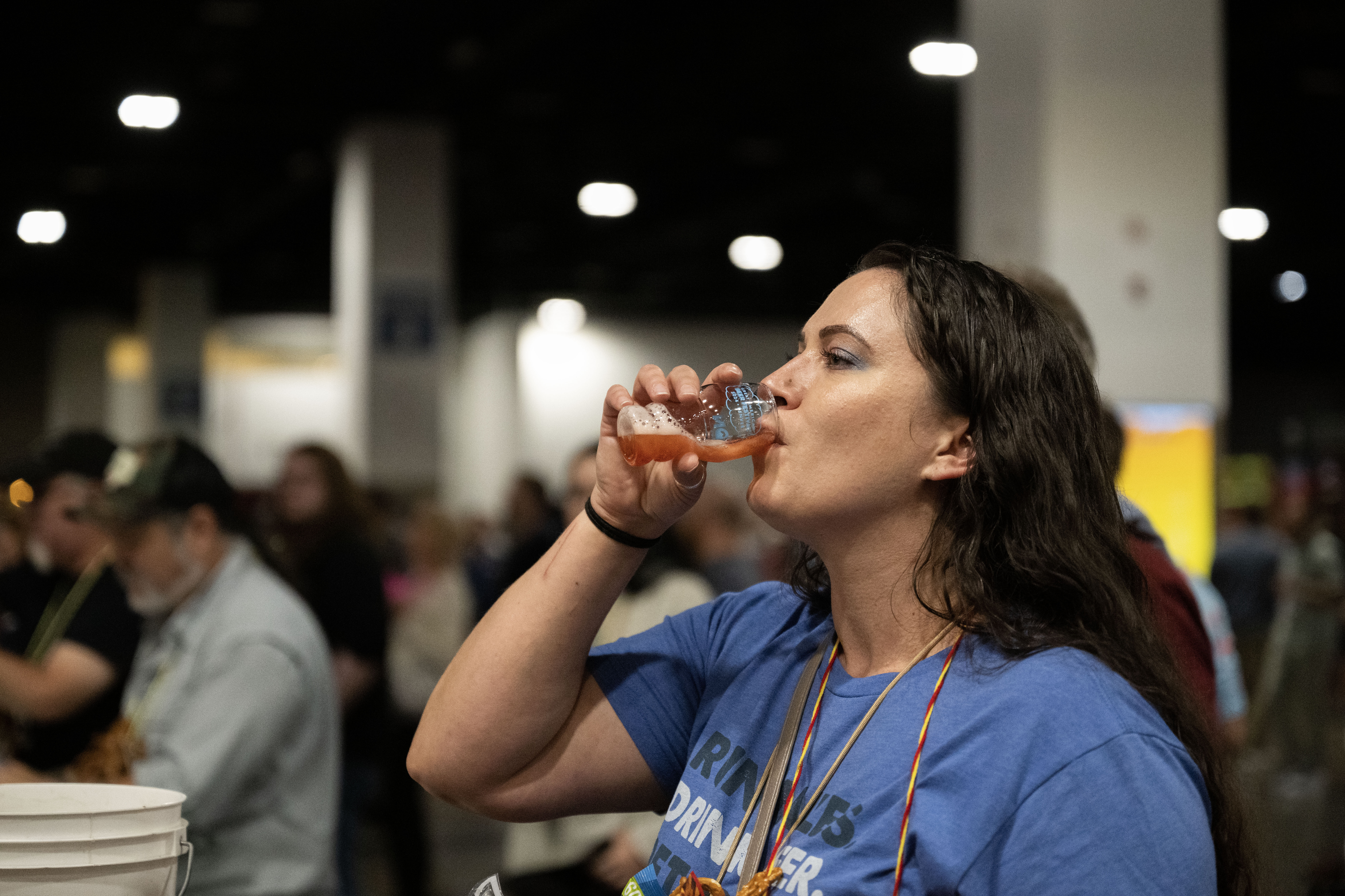 Victoria Wolcott tastes a sample from Riverstone Brewing on the opening night of the Great American Beer Festival on Thursday, Oct. 10, 2024 (Stephen Swofford, Denver Gazette) (Stephen Swofford Denver Gazette)