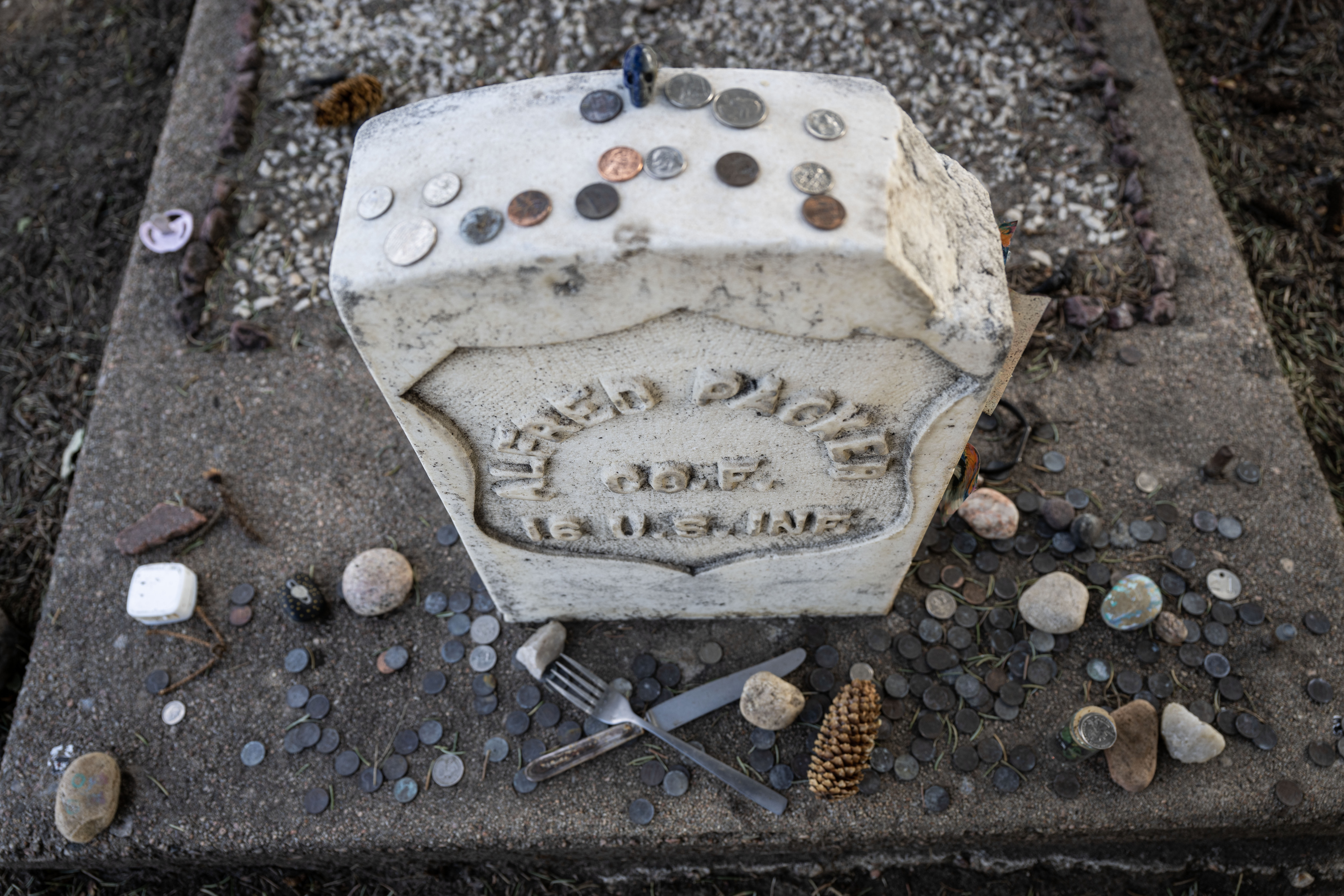 Alfred Packer is the only man in US History to be convicted of a crime related to Cannibalism. His headstone lies in the Littleton Cemetery, where people leave coins and trinkets such as silverware, painted stones, and occasionally chicken bones. (Stephen Swofford, Denver Gazette) (Stephen Swofford Denver Gazette)