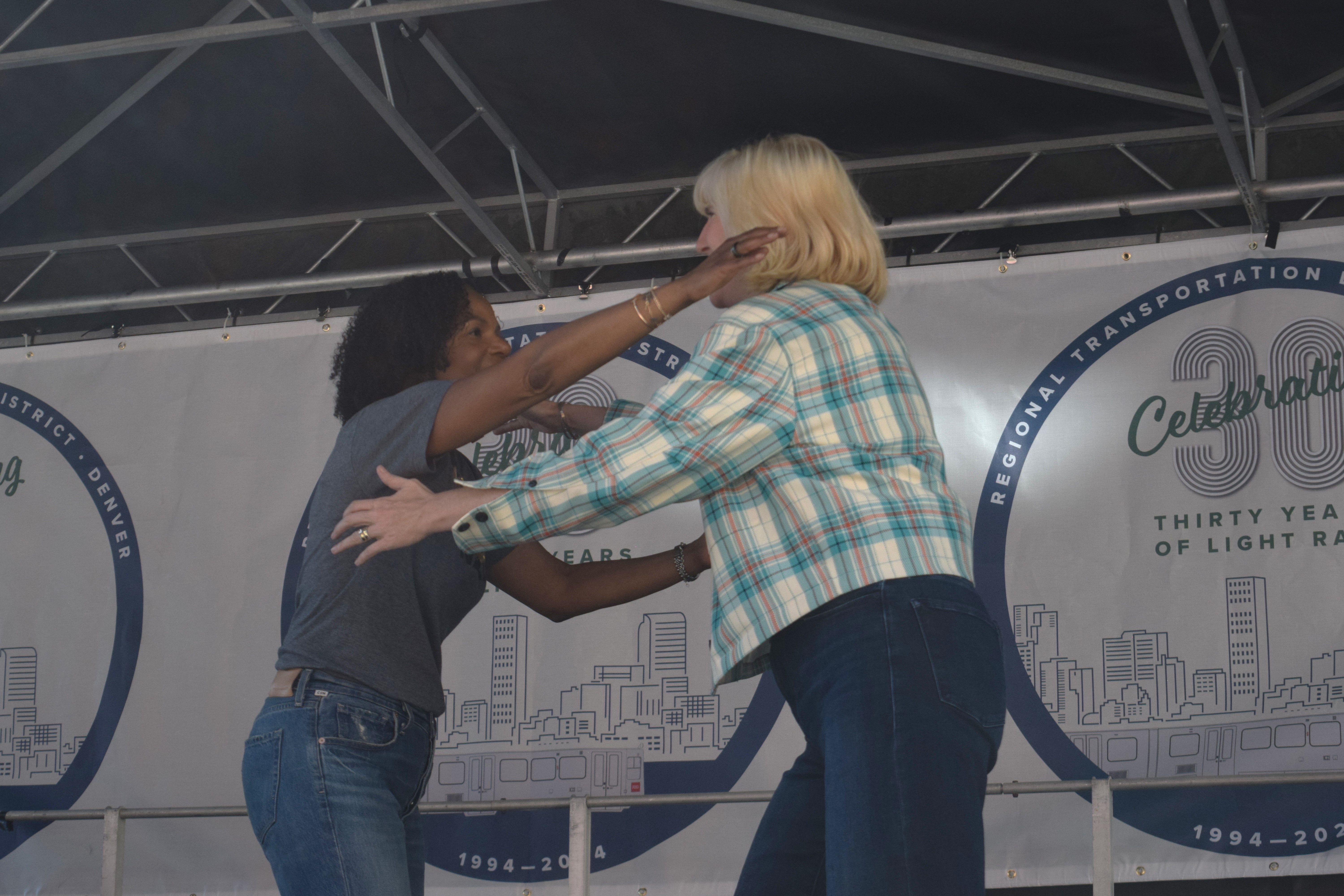 RTD General Manager and CEO Debra Johnson, left, hugs Amy Ford, the executive director to the Denver Department of Transportation and Infrastructure, at the agency's 30-year celebration of the light rail on Saturday morning. (SageKelleyJefferson County Reportersage.kelley@denvergazette.comhttps://denvergazette.com/content/tncms/avatars/e/5f/457/e5f45740-2717-11ee-85b2-ab80f2d36252.5b966c1d2ce4987987665d57c237eda4.png)
