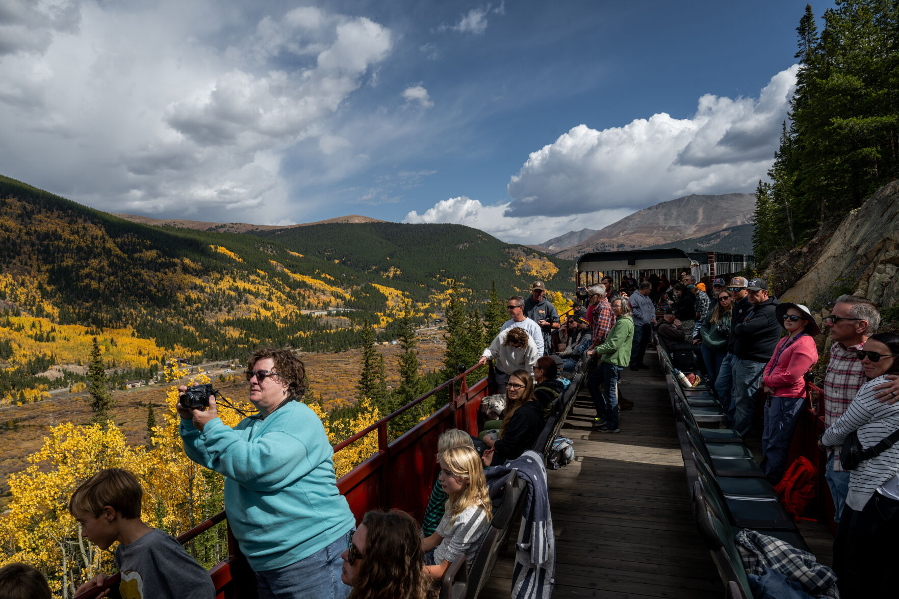Passengers take in the fall colors from a scenic ride on the historic Leadville Railroad, Friday, Sept. 27. Originally owned by the Denver South Park & Pacific Railroad the “highline” was completed in 1884. In 1987, it was bought from by Burlington Railroad by Leadville locals Ken and Stephanie Olsen. The couple purchased two GP9 Diesel electric locomotives, eight flat cars, four boxcars, five cabooses, the roundhouse, over 14 miles of track and thousands of railroad ties, spikes and rails — for the whopping cost of $10. (Parker Seibold, The Gazette)