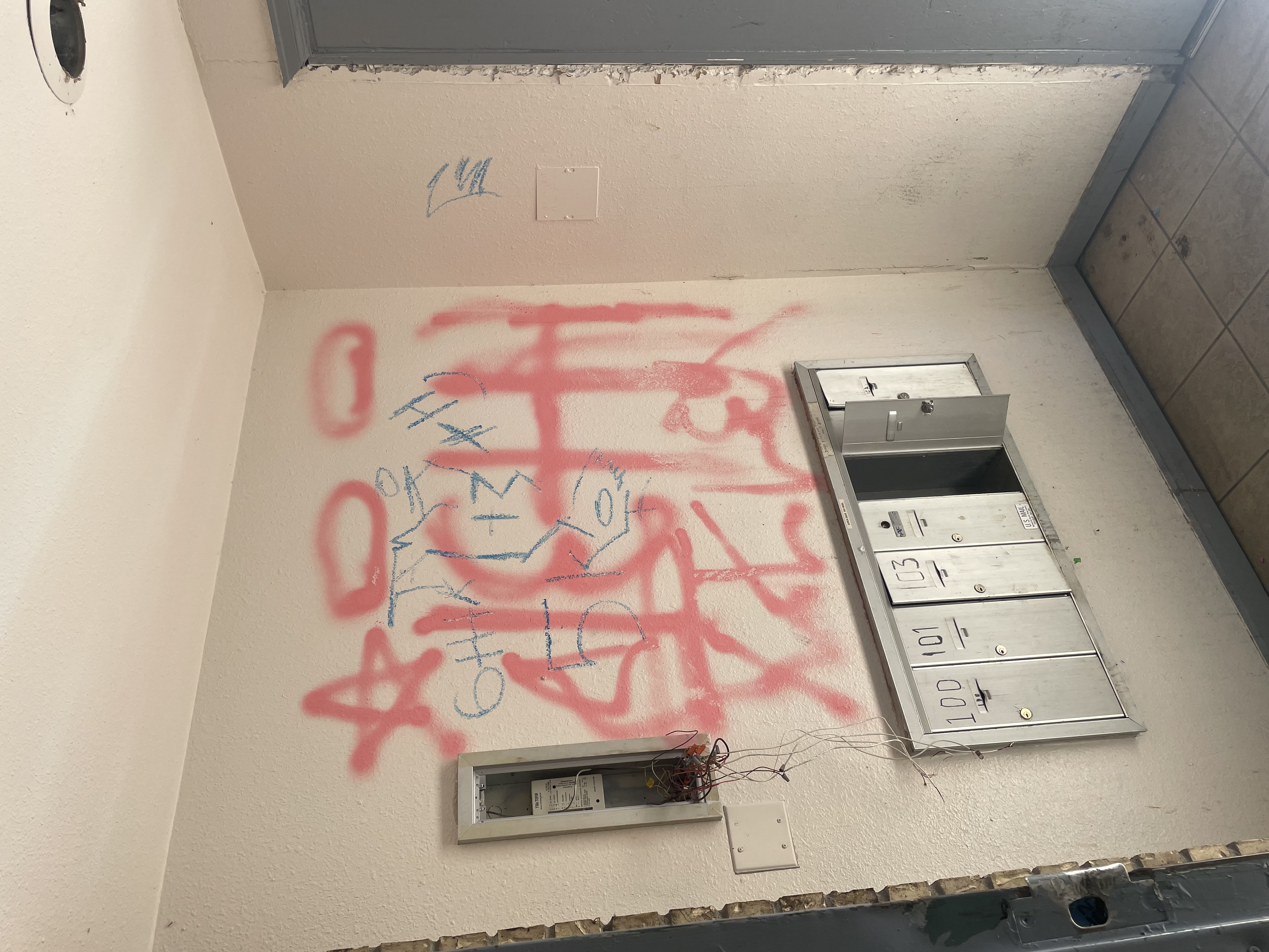 Graffiti is a common sight on the walls of the Whispering Pines complex in Aurora. This is photo was taken in the entry way of one of three buildings. Below are mailboxes and electrical wires spring from what appears to have been an electrical box. (CarolMcKinleyDenver Enterprise Reportercarol.mckinley@gazette.comhttps://denvergazette.com/content/tncms/avatars/5/c3/a0f/5c3a0fbe-1007-11ec-9e18-b7f42cfa4b0f.9565a0ce58866e86bcf18260621c2a46.png)