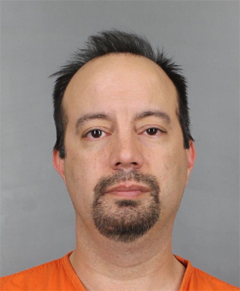 Littleton man arrested after allegedly running over another driver