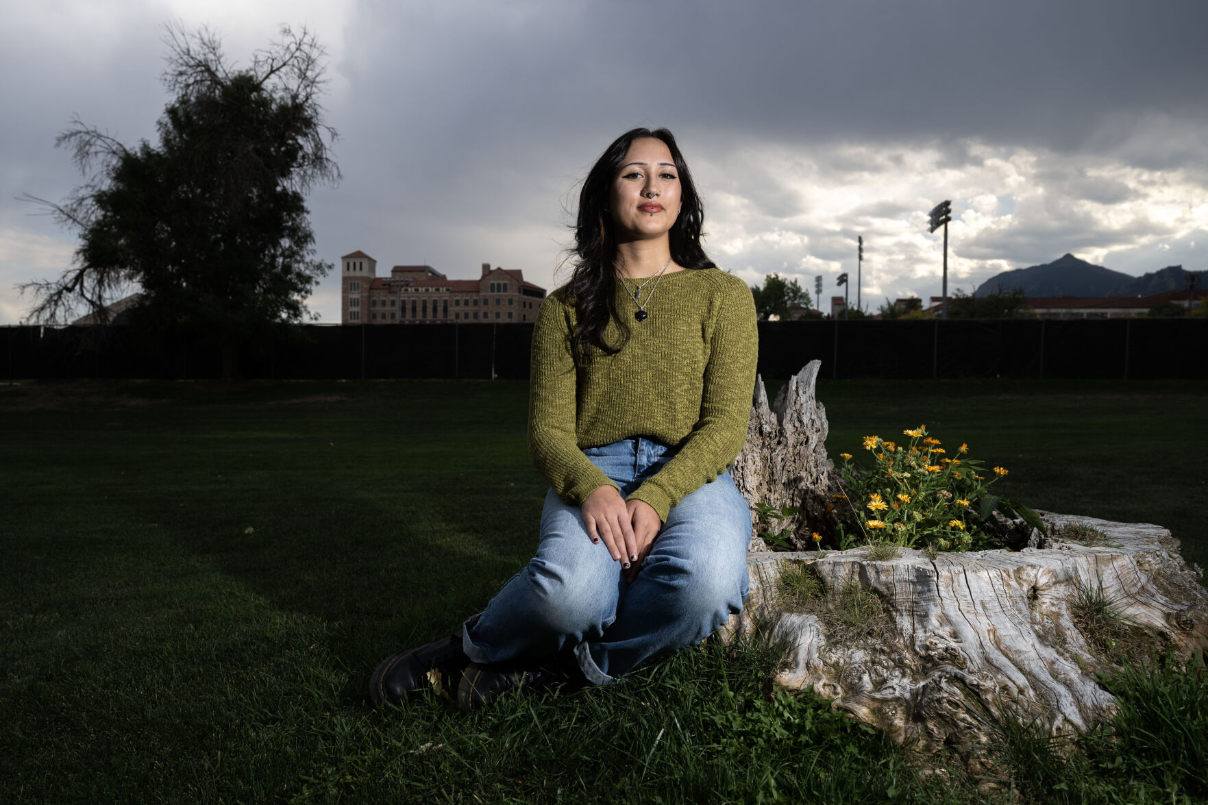 Alexandra Organa sits for a portrait near campus in Boulder this month. She was forced to go to reunification therapy with her father that was conducted by Joyce Miller. (Stephen Swofford, the Gazette)