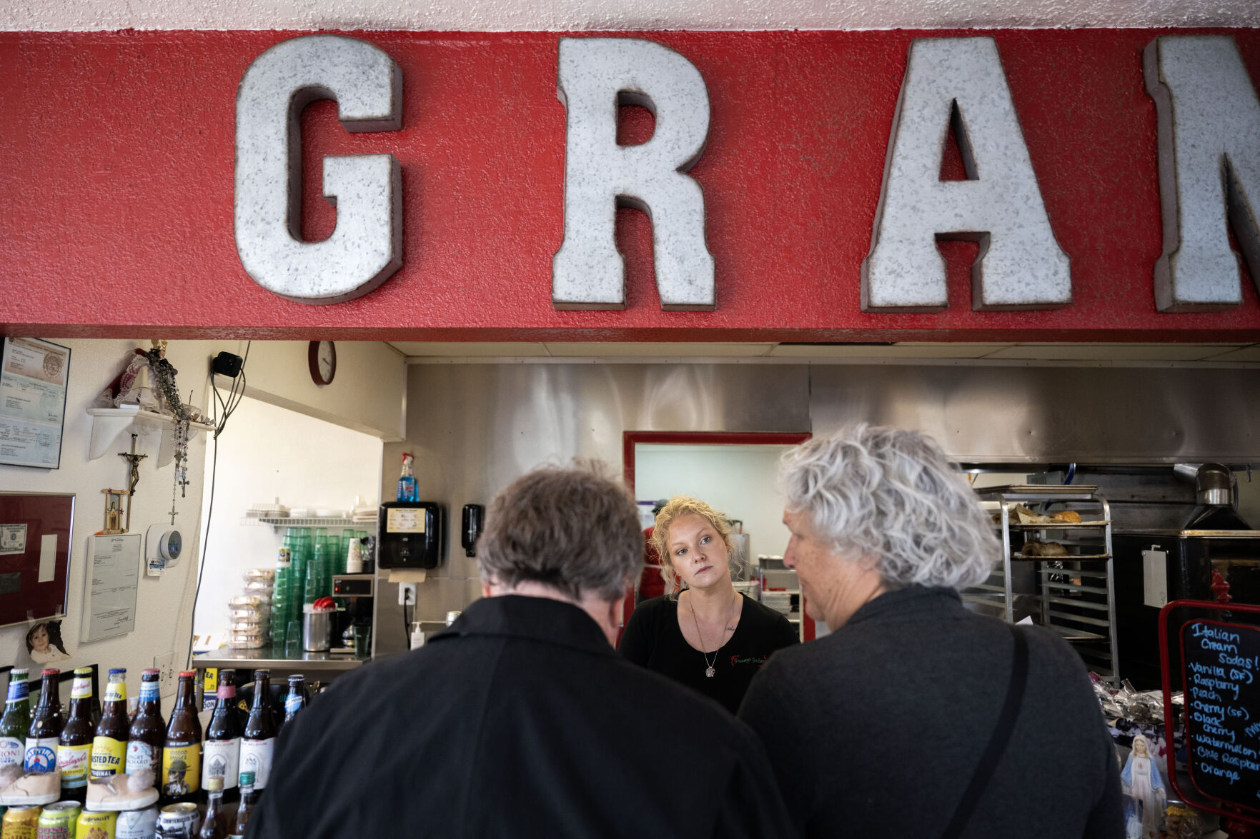 Kylie Corder helps customers from behind the counter at Grammy’s Goodies in Wheat Ridge on Thursday, Oct. 3, 2024 (Stephen Swofford, Denver Gazette) (StephenSwoffordPhotographerstephen.swofford@gazette.comhttps://secure.gravatar.com/avatar/1ddcaf11c5d70eaa58546ddc4e038687?d=mm&r=g)