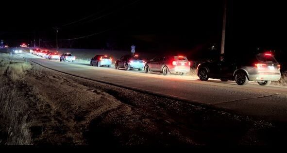 A steady stream of cars of evacuees head out Monday night as 700 homes are threatened in the Highland Lakes Fire in Divide. (Courtesy of Teller County Sheriff’s Office)