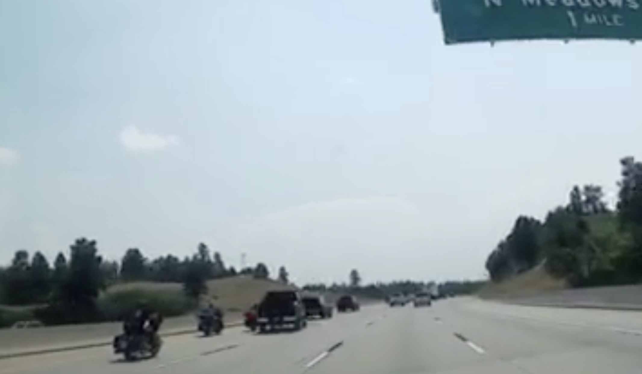 Dash cam video taken August 16, 2020 shows Alberto Mota's black F-250 swerving toward a group of motorcyclists at mile marker 187 on I-25 headed southbound near Happy Canyon Road. (Courtesy 18th Judicial District)