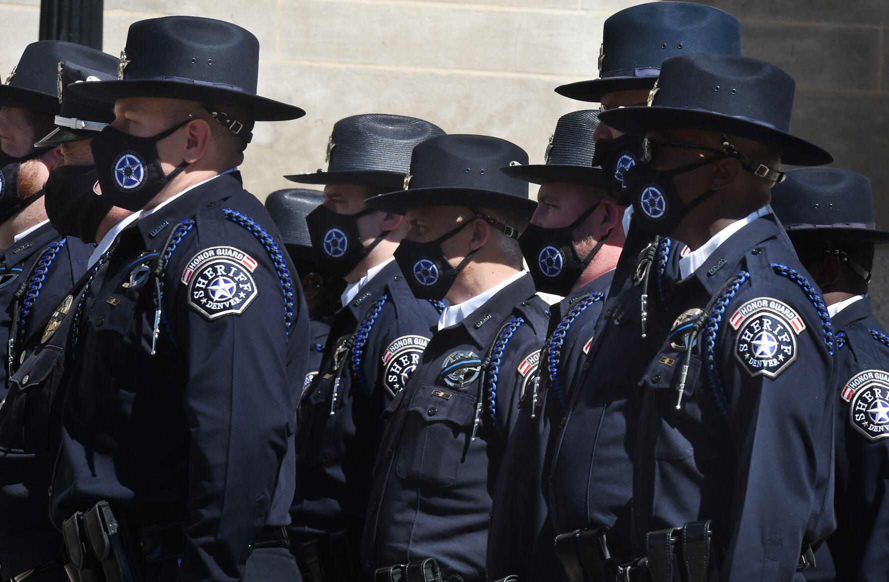 FILE PHOTO: Members of the Denver County Sheriff’s Honor Guard stand at attention as mourners enter a cathedral for a funeral for a fallen officer. A Roman Catholic funeral Mass celebrated the life of Boulder Police Officer Eric Talley on Monday, March 29, 2021. (JerileeBennettjerilee.bennett@gazette.comhttps://secure.gravatar.com/avatar/a400b0ac348f1407dc2709999dc38d3b?d=mm&r=g)