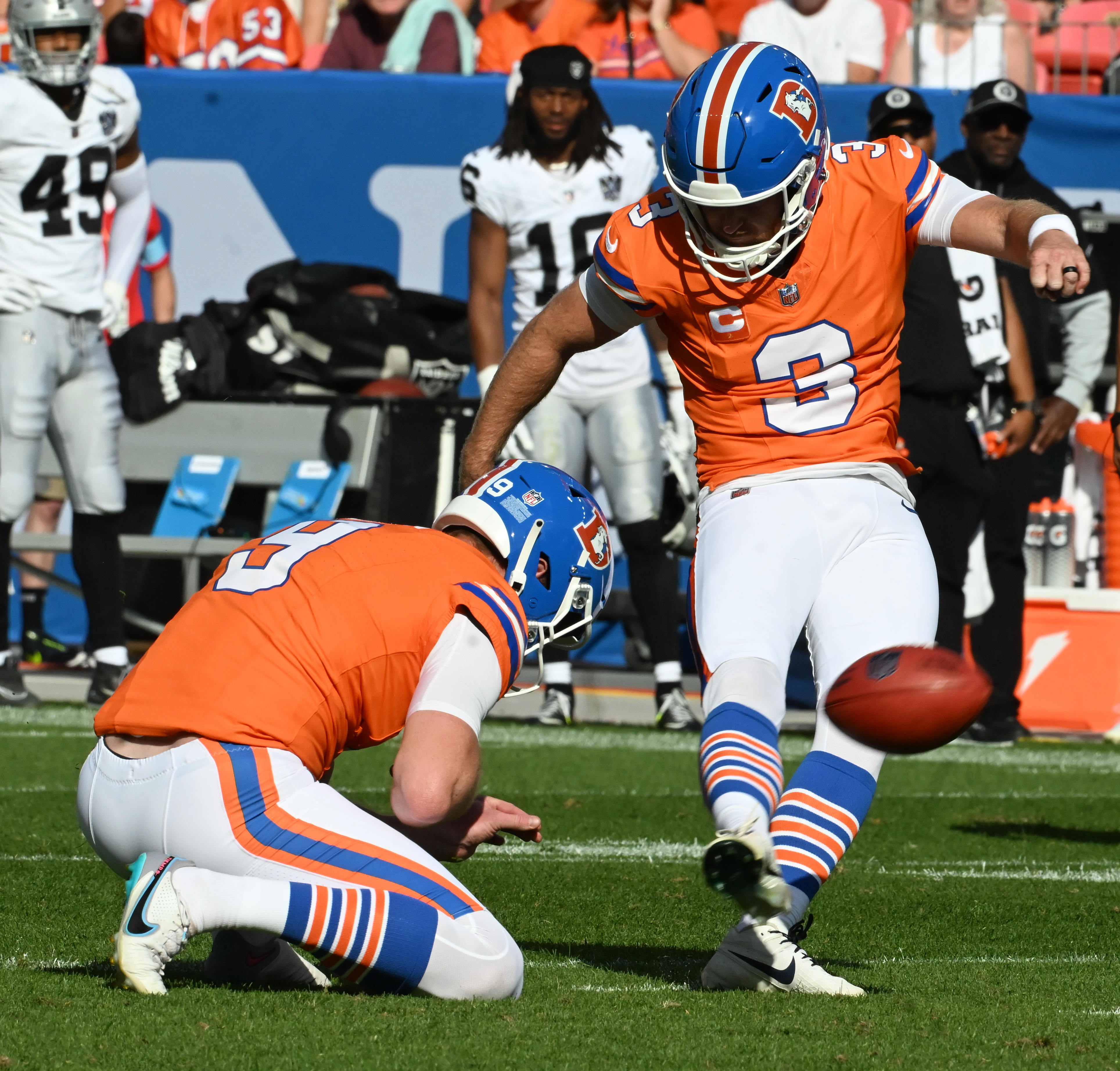 Denver Broncos place kicker Wil Lutz (3) kicks a field goal during a game against the Raiders at Empower Field at Mile High on Sunday, Oct. 6, 2024.
