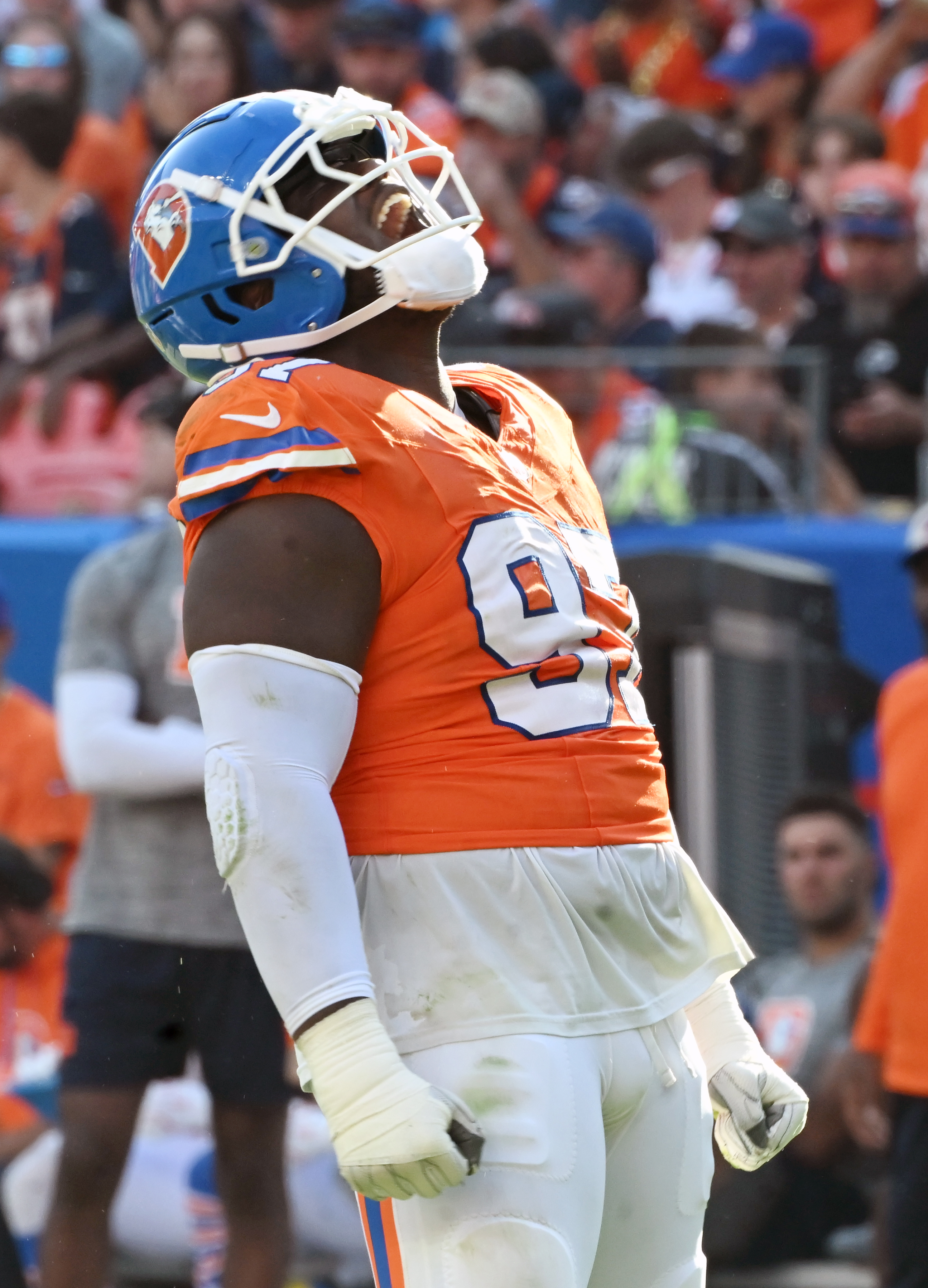 Denver Broncos defensive tackle Malcolm Roach (97) celebrates a play during a game against the Raiders at Empower Field at Mile High on Sunday, Oct. 6, 2024. (Jerilee Bennett The Gazette)