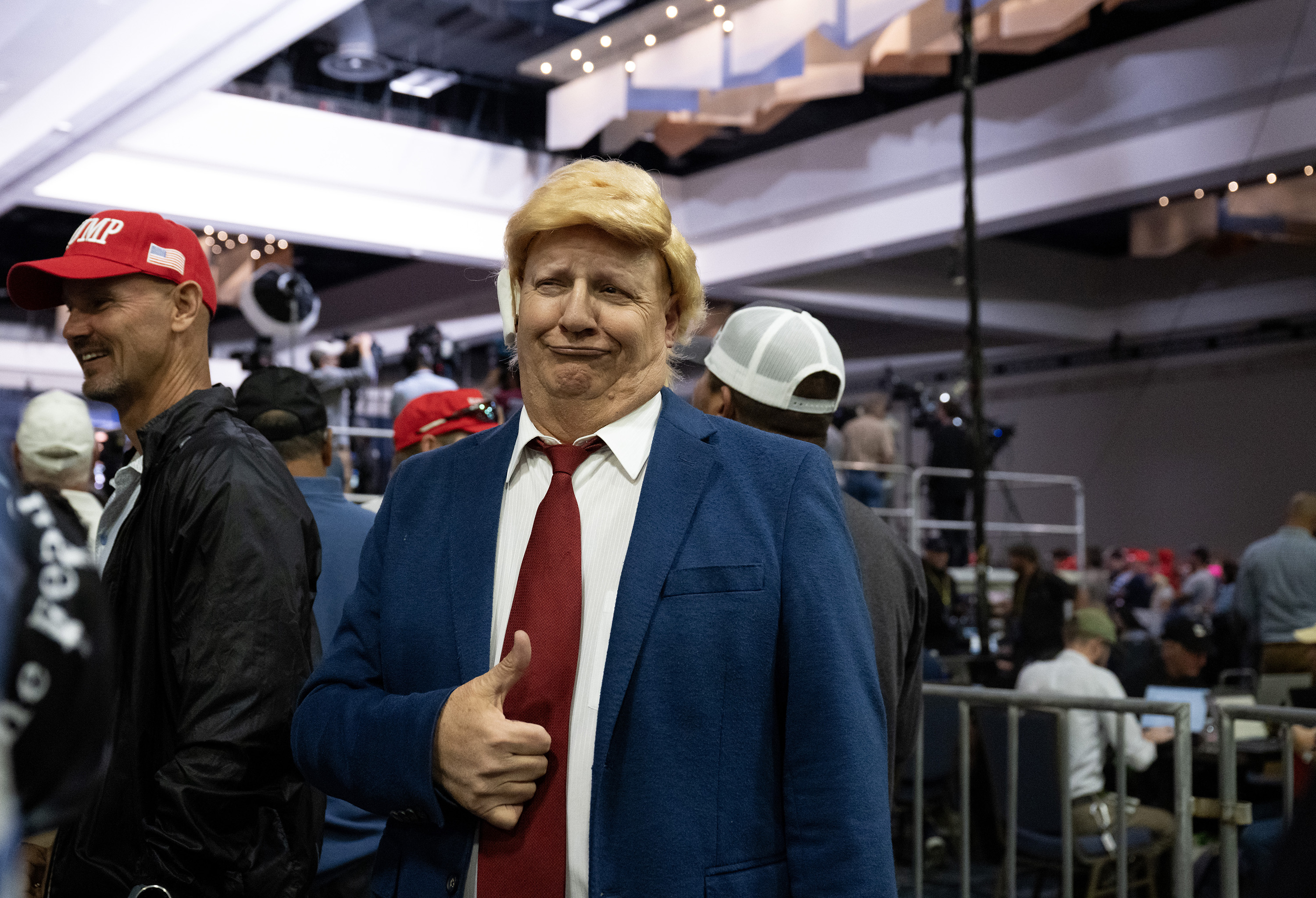 Tom Faddis, who goes by Tommy Trumper” poses for photographs at a campaign rally for former President Donald Trump at the Gaylord Rockies Resort and Convention Center, Friday, Oct. 11, 2024, in Aurora, Colo. (Parker Seibold, The Gazette) (Parker Seibold, The Gazette)