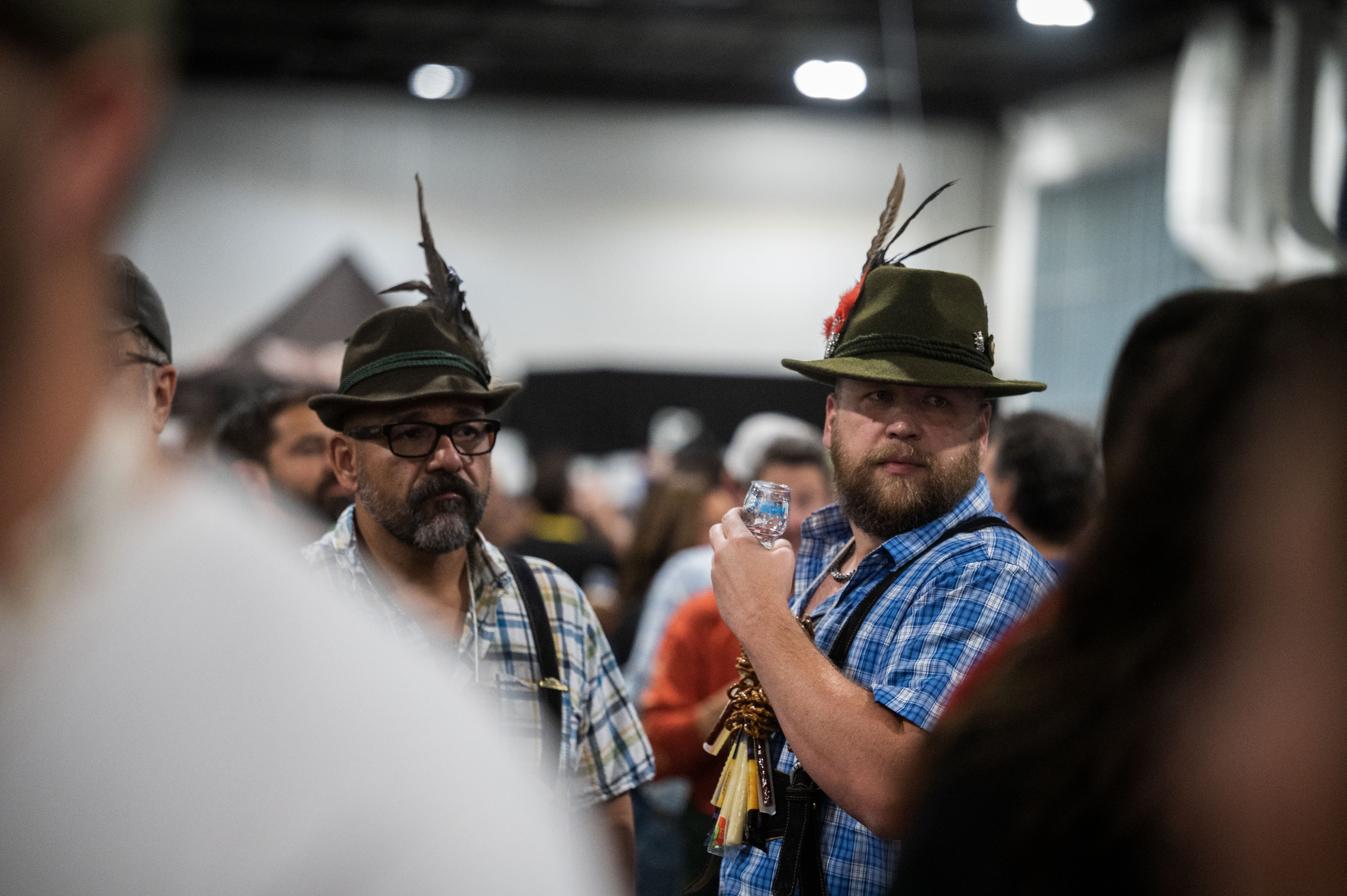 Carlos Barahas, left, and Jack Johnson, eye their next tasting as they sample a beer on the opening night of the Great American Beer Festival on Thursday, Oct. 10, 2024 (Stephen Swofford, Denver Gazette) (Stephen Swofford Denver Gazette)