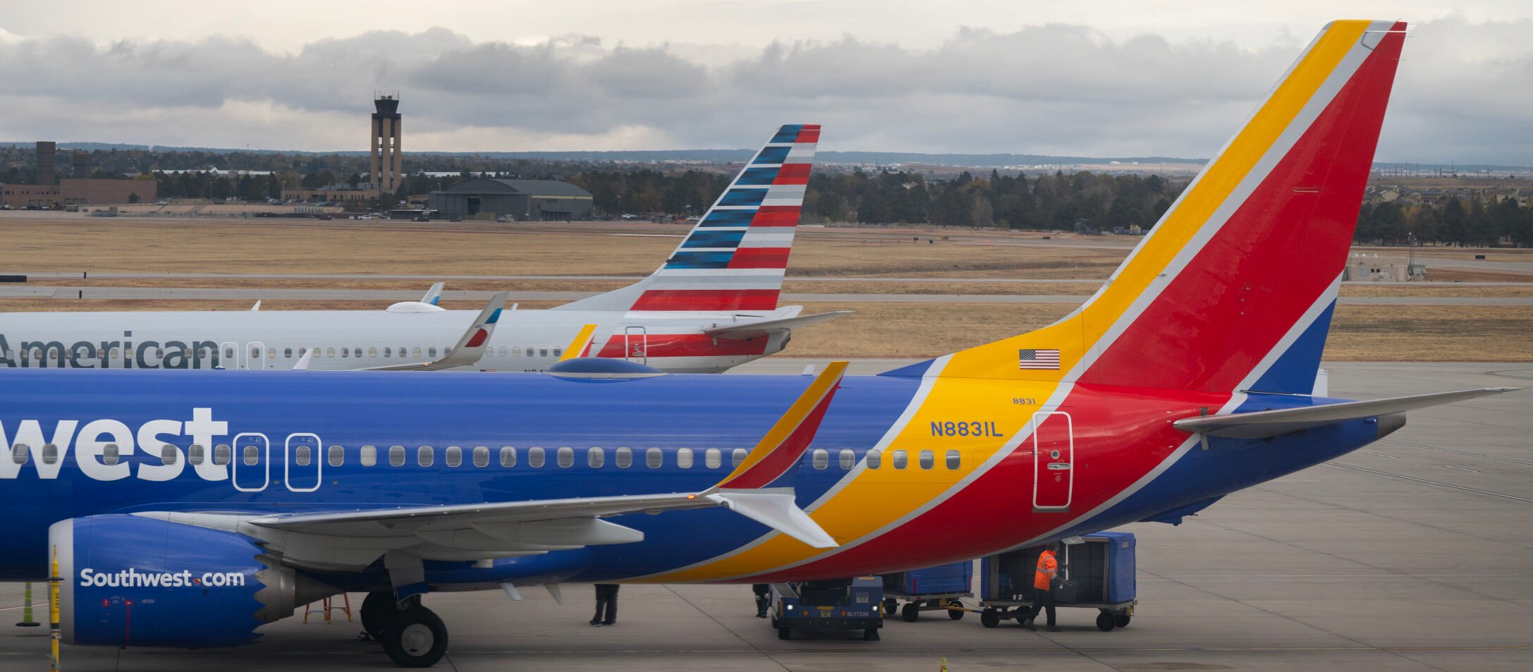 Workers unload baggage from a Southwest Airlines flight Wednesday, Oct. 30, 2024, at the Colorado Springs Airport. Southwest announced Wednesday that it'll add a non-stop flight to Cancun from Colorado Springs beginning in June of 2025. It'll be the first international flight from the airport. (The Gazette, Christian Murdock) (Christian Murdock)