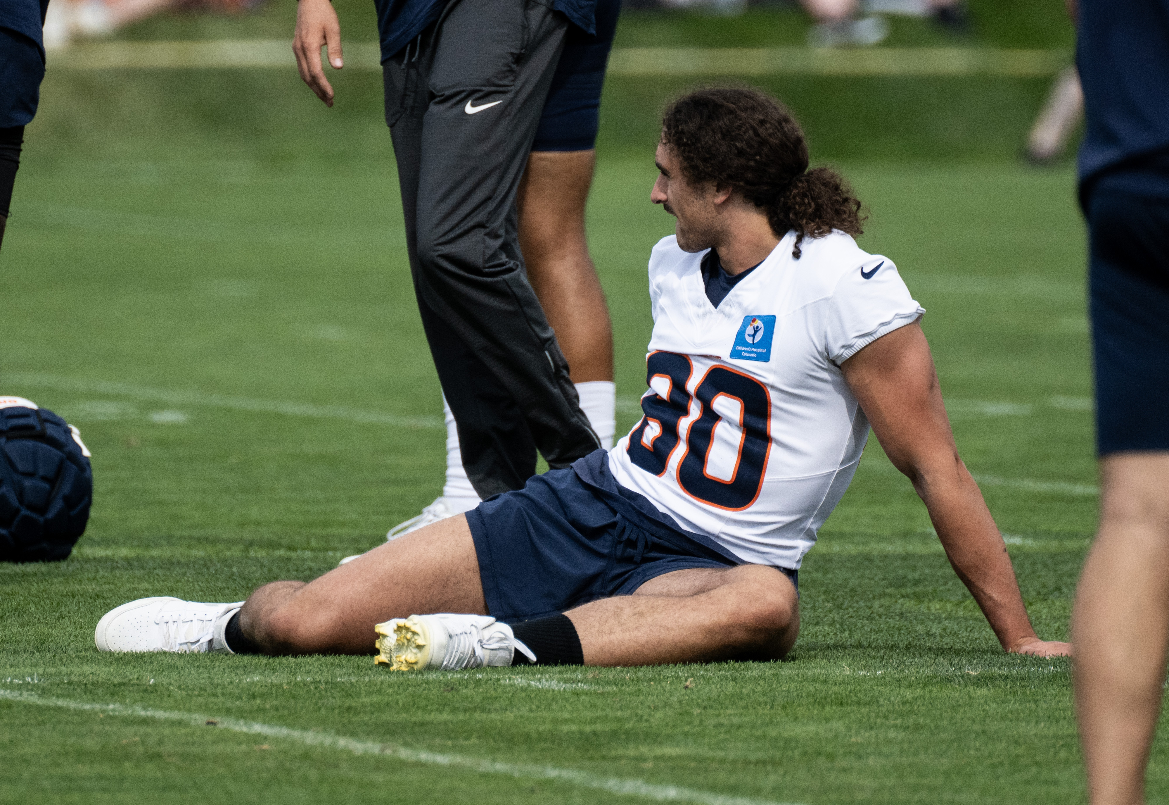 Denver Broncos tight end Greg Dulcich stretches during the first day of training camp on Friday, July 26, 2024, at their facility in Centennial, Colo. (Parker Seibold, The Gazette) (Parker Seibold, The Gazette)
