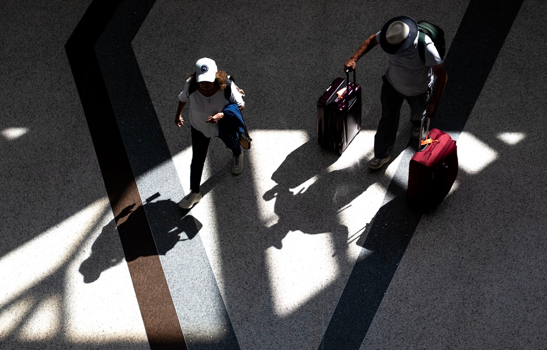 Travelers arrive at the Colorado Springs Airport in this file photo from September 2023. (Parker Seibold, THe Gazette file)