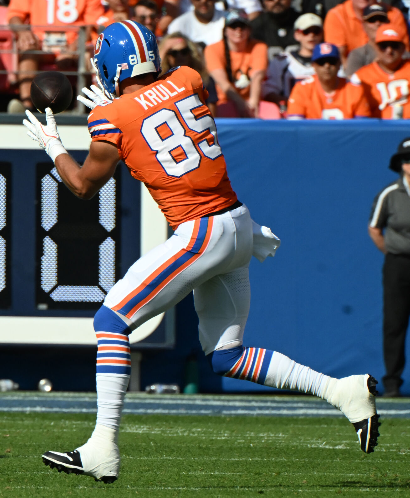 Denver Broncos tight end Lucas Krull (85) pulls in a catch during the second quarter of a game at Empower Field at Mile High on Sunday, Oct. 6, 2024. The Broncos won the game 34-18. (Jerilee Bennett The Gazette)