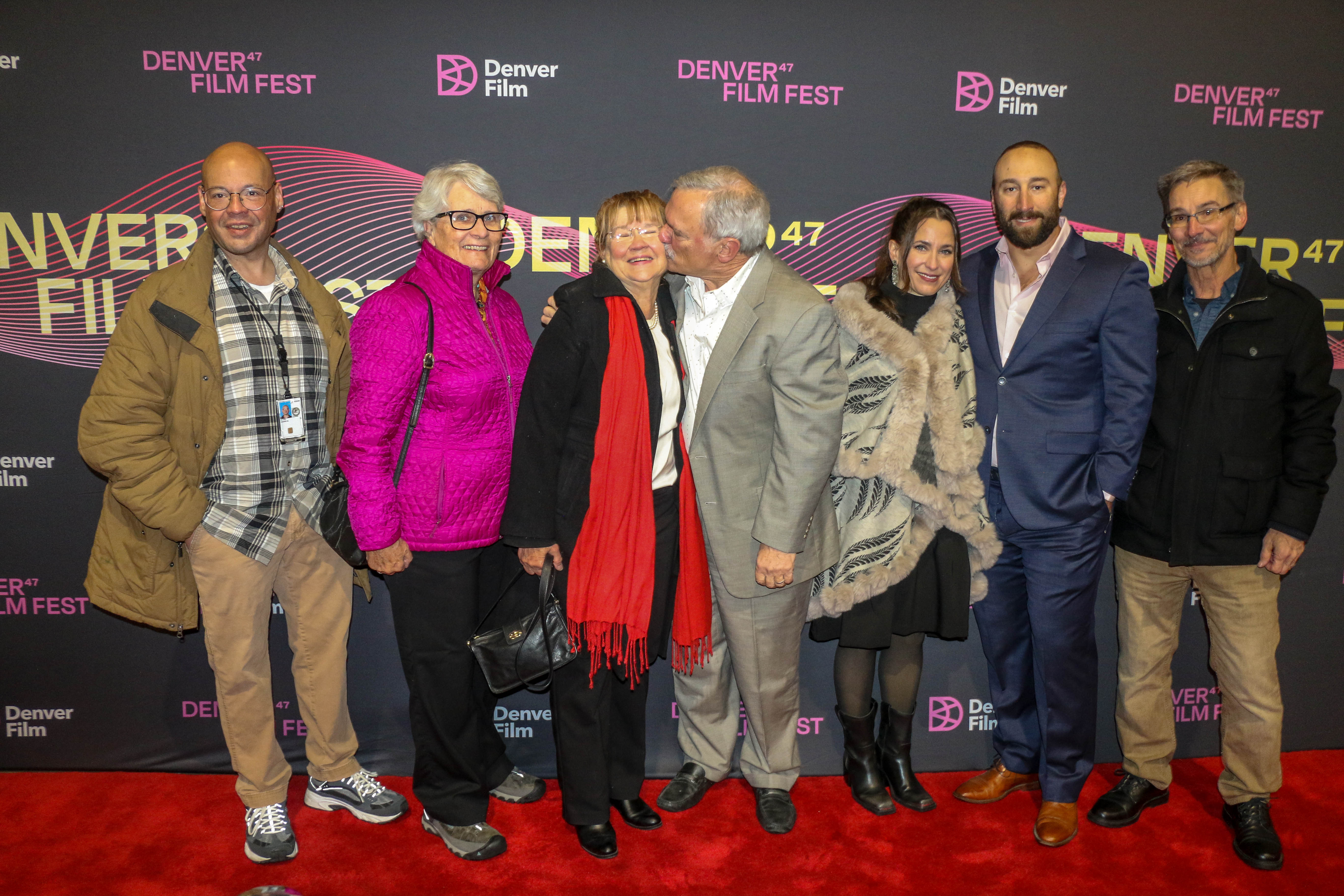 Former journalist and current Denver City Councilman Kevin Flynn is joined by his wife, Harriet, and other extended family members on the the 2024 Denver Film Festival red carpet before the U.S. premiere screening of 