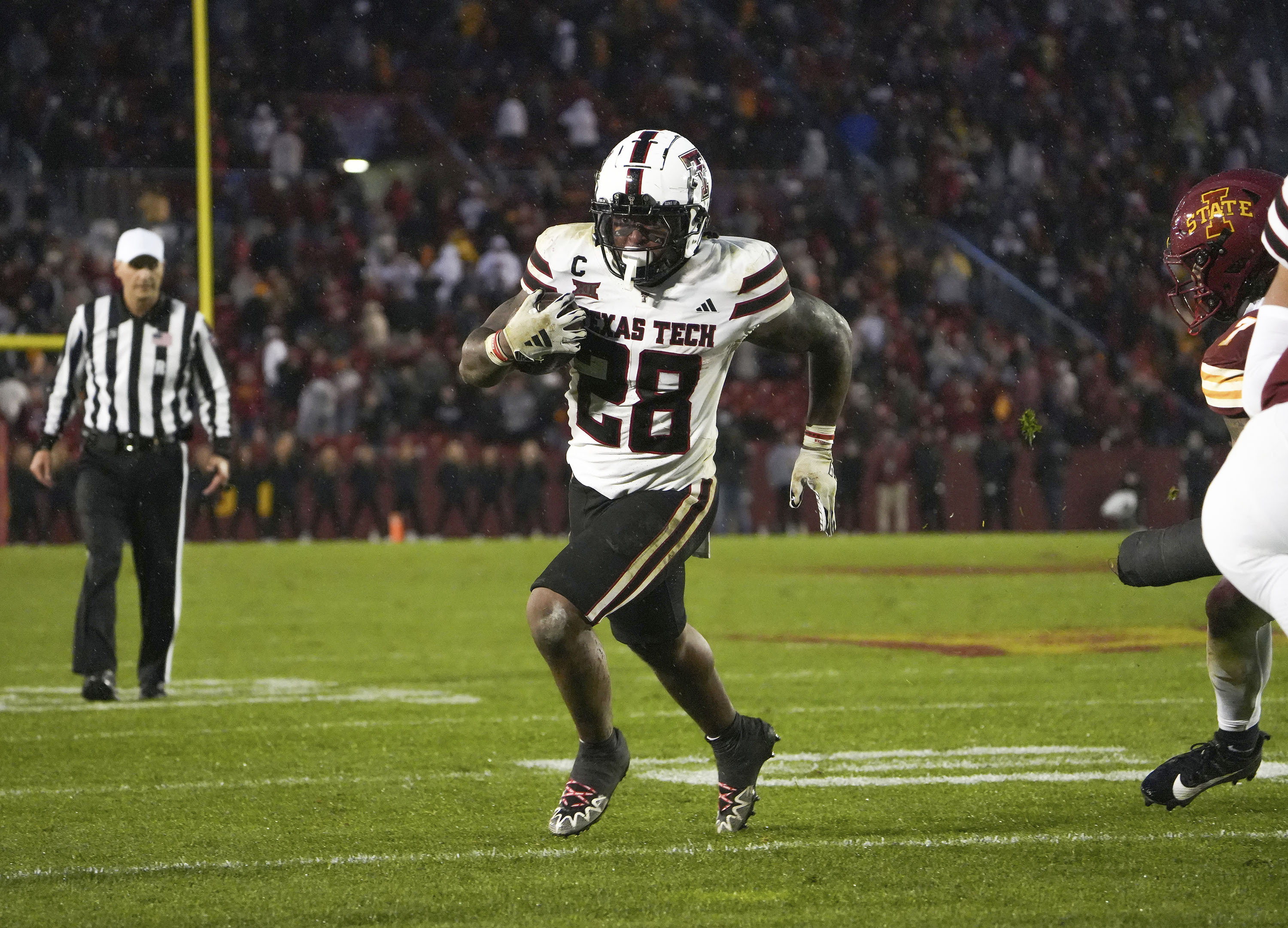 Texas Tech running back Tahj Brooks (28) runs into the end zone for a touchdown late in the second half of an NCAA college football game against Iowa State, Saturday, Nov. 2, 2024, in Ames, Iowa. (AP Photo/Bryon Houlgrave) (Bryon Houlgrave)