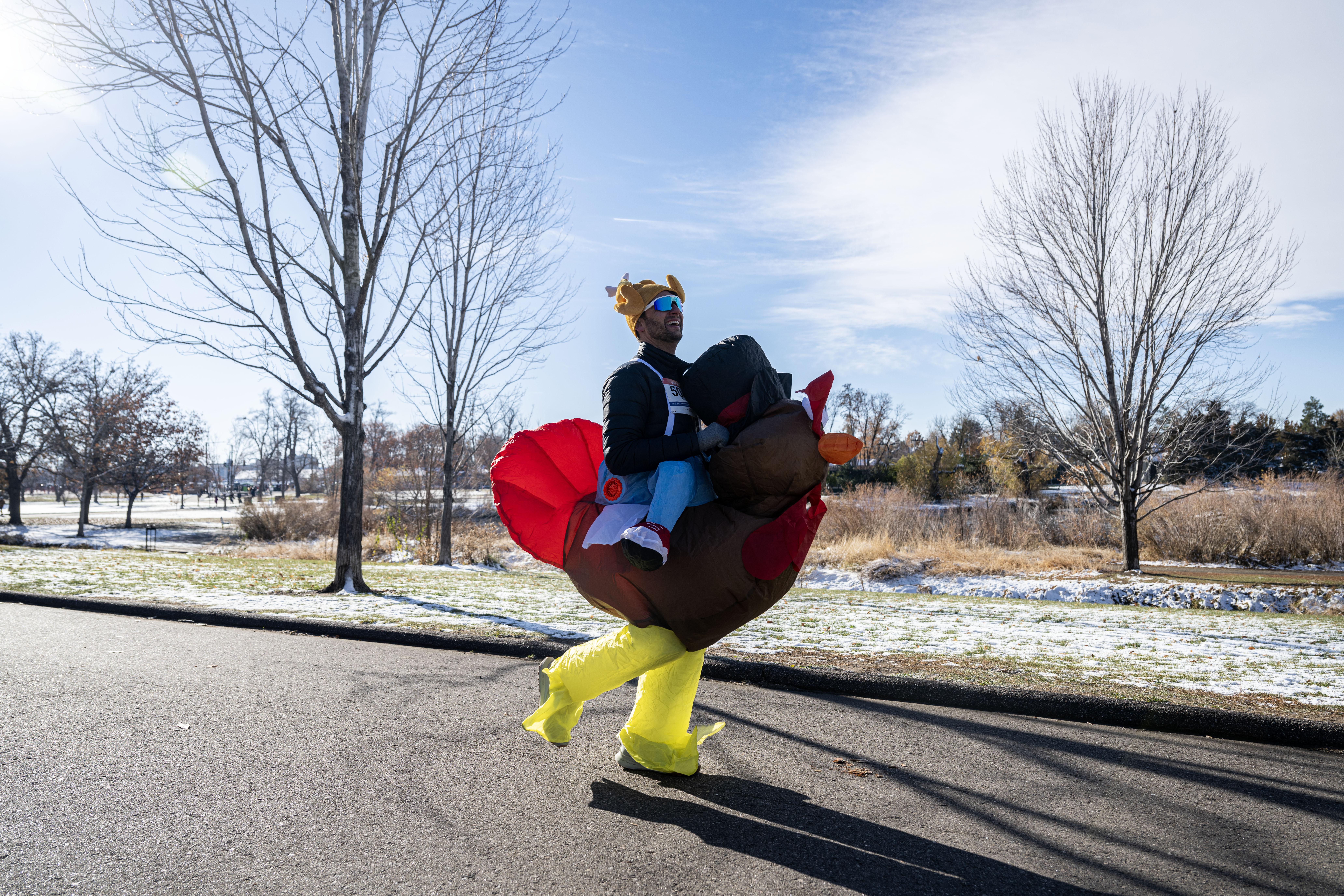 Brandon Tarbert, from New York City, runs through Washington Park during the 51st Mile High United Way Turkey Trot in Denver on Thursday, Nov. 28, 2024. (Stephen Swofford, Denver Gazette) (StephenSwoffordPhotographerstephen.swofford@gazette.comhttps://secure.gravatar.com/avatar/1ddcaf11c5d70eaa58546ddc4e038687?d=mm&r=g)