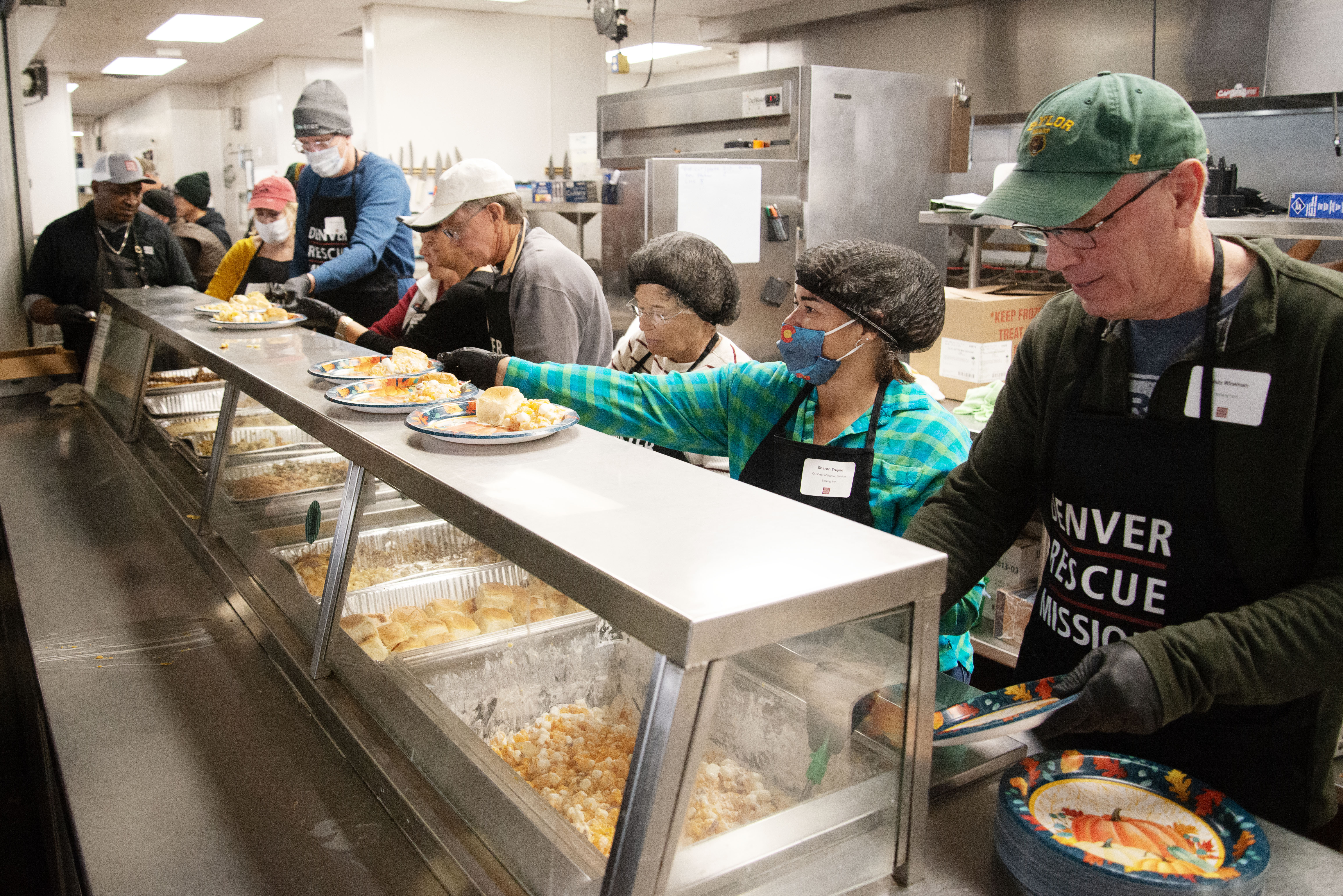 Denver Rescue Mission staff and volunteers serve 537 Thanksgiving meals to Denver's needy population at their Lawrence St. location the day before Thanksgiving on Wednesday, Nov. 27, 2024. At another mission shelter, another estimated 600 individuals were served. 