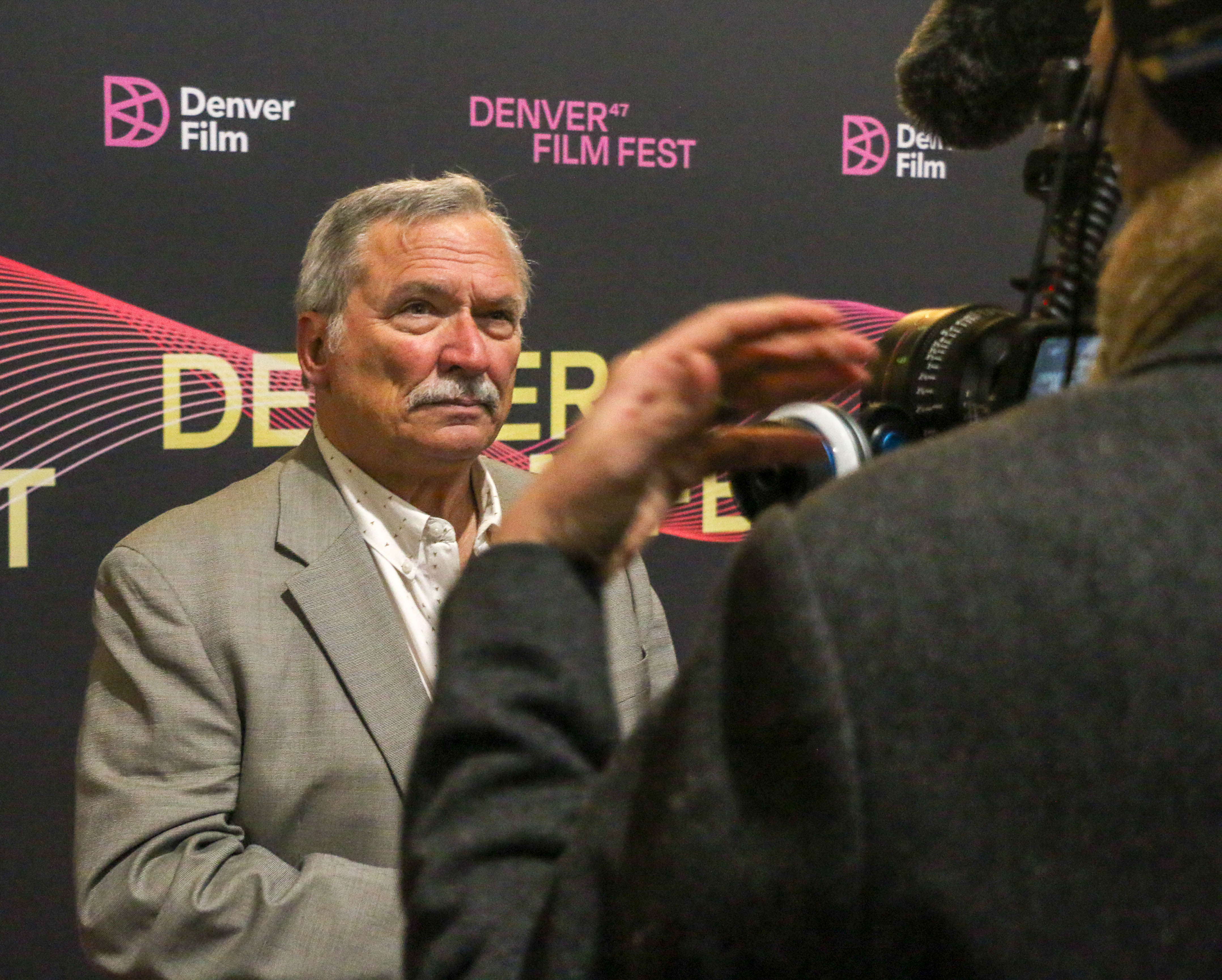 Former journalist and current Denver City Councilman Kevin Flynn is interviewed on the 2024 Denver Film Festival red carpet before the U.S. premiere screening of 