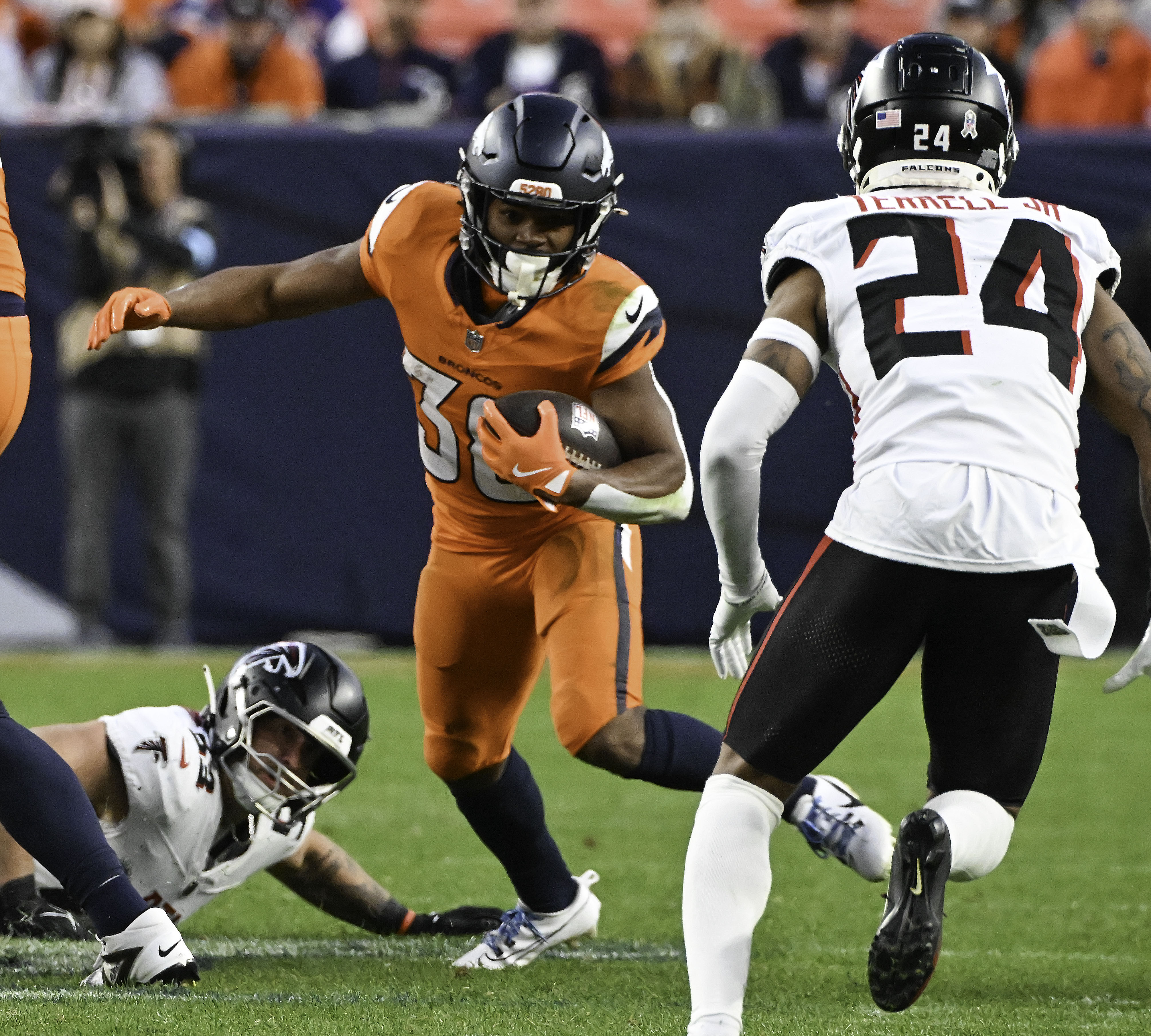 Denver Broncos running back Jaleel McLaughlin (38) runs with the ball during a game against the Falcons at Empower Field at Mile High on Sunday, Nov. 17, 2024. (Jerilee Bennett,The Gazette)