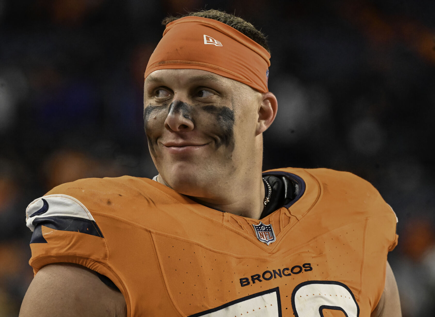 Denver Broncos offensive tackle Garett Bolles (72) is all smiles at the end of a game against the Falcons at Empower Field at Mile High on Sunday, Nov. 17, 2024. (Jerilee Bennett,The Gazette)