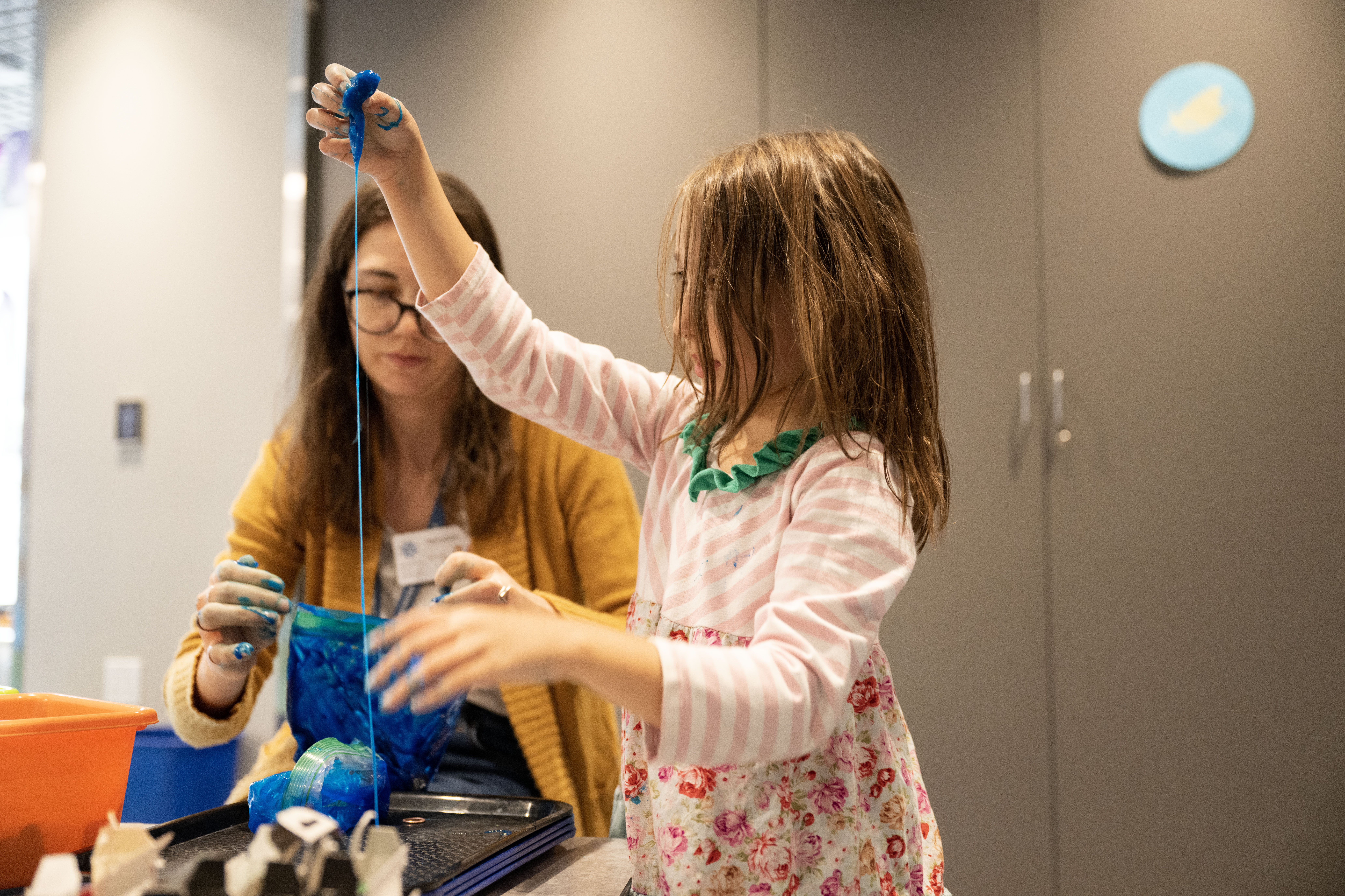 Meredith Wilde, a Library Assistant at the Denver Public Library, helps Kiara Kupersmit, 6, make a bag of slime during a Kids Create learning event at the Central Library in Denver on Tuesday, Sept. 17, 2024. The library fully reopens Sunday, Nov. 3, 2024. (Stephen Swofford, Denver Gazette) (StephenSwoffordPhotographerstephen.swofford@gazette.comhttps://secure.gravatar.com/avatar/1ddcaf11c5d70eaa58546ddc4e038687?d=mm&r=g)