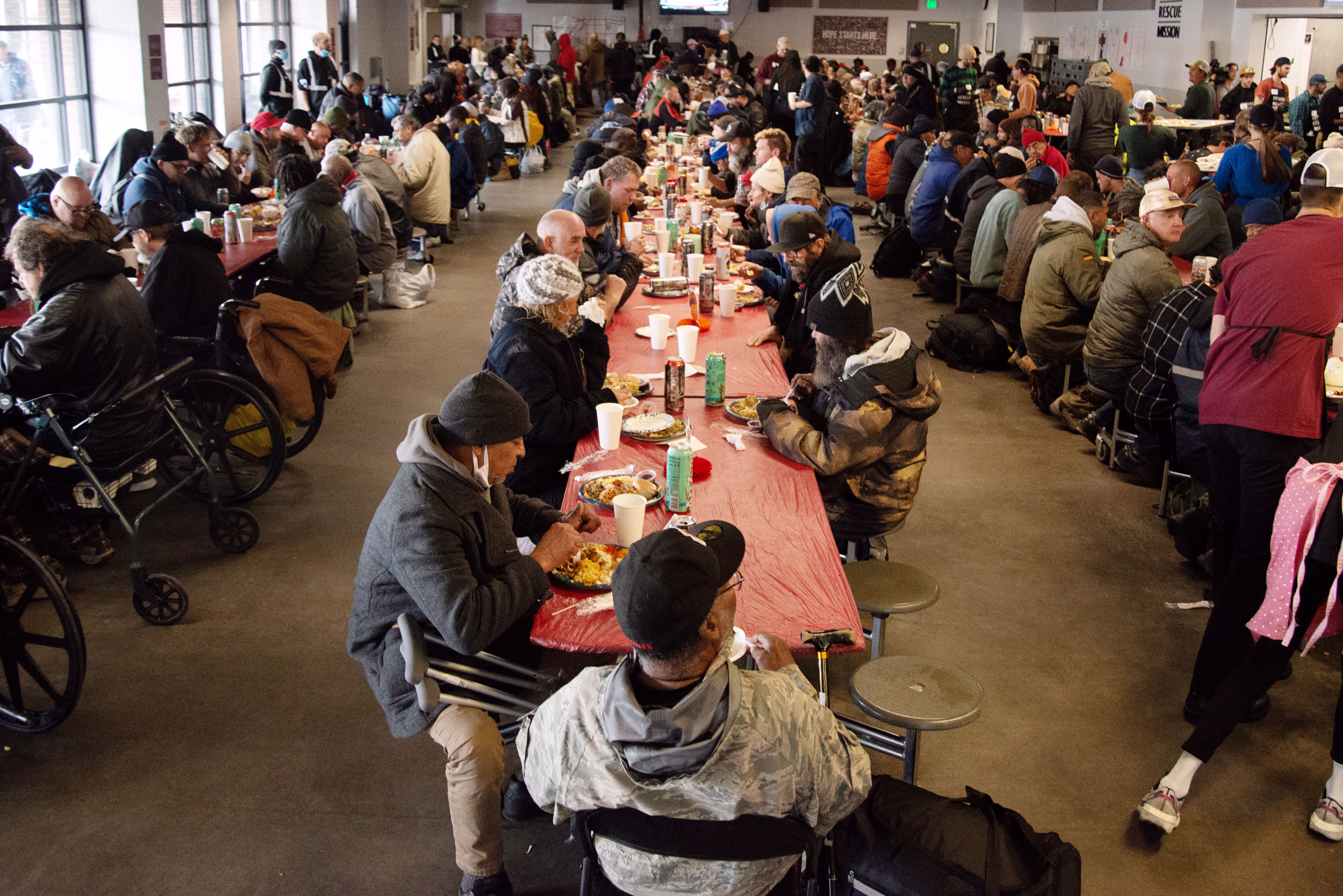 Denver Rescue Mission staff and volunteers serve 537 plates of Thanksgiving meals to Denver's needy population the day before the holiday on Wednesday, Nov. 27, 2024. At another mission shelter, another 600 individuals were served. 