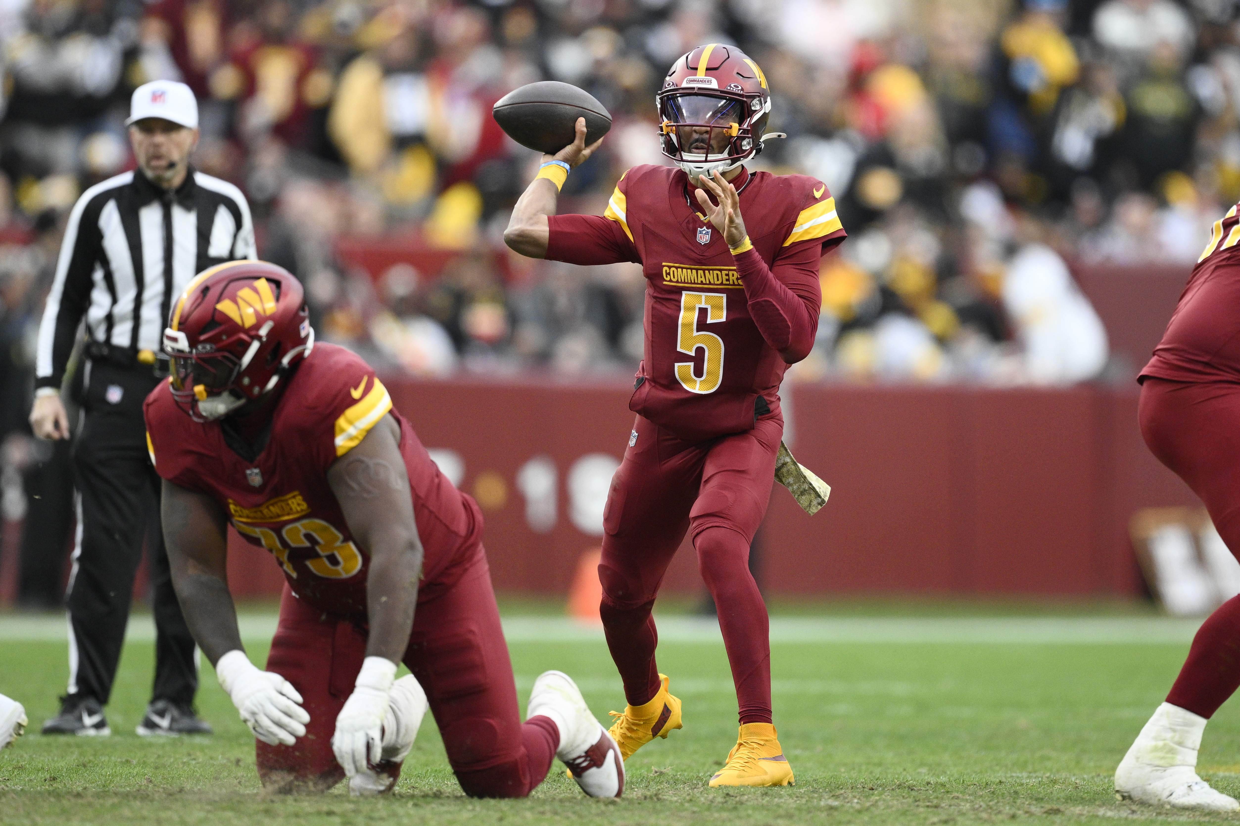 Washington Commanders quarterback Jayden Daniels (5) in action during the second half of an NFL football game against the Pittsburgh Steelers, Sunday, Nov. 10, 2024, in Landover, Md. (AP Photo/Nick Wass) (Nick Wass)