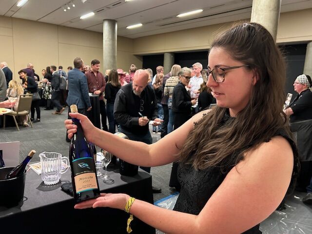 Whitewater Hill Vineyards Winemaker Chloe Nicoson shows off the double gold winning 2023 Moscato wine at Colorado Uncorked at History Colorado Friday Nov. 1, 2024. (DennisHuspeniCity Editordennis.huspeni@gazette.comhttps://denvergazette.com/content/tncms/avatars/c/5a/fbd/c5afbd32-5030-11eb-bdef-030d9de52a9e.779683cee495ffe64766291c251a8894.png)