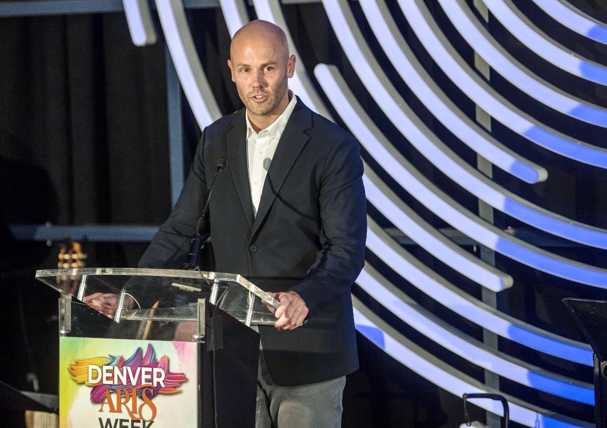 Kevin Smith, CEO of Denver film, speaking at Denver's Dazzle jazz club to help kick off Denver Arts Week on Nov. 1, 2024. (JOHN MOORE, DENVER GAZETTE)