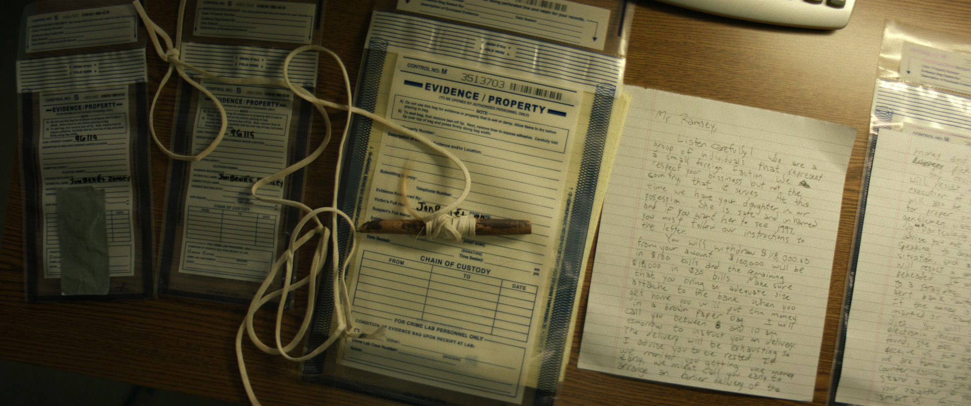 This is a police photo of the crudely-made garotte which was found embedded in JonBenét Ramsey's neck and of the two-and-a-half page ransom note, two of the most critical pieces of evidence in the unsolved murder. The photo was supplied to The Denver Gazette by producers of Cold Case: Who Killed JonBenét Ramsey, a three-part docuseries scheduled to air Nov. 25. (Courtesy photo, Netflix)