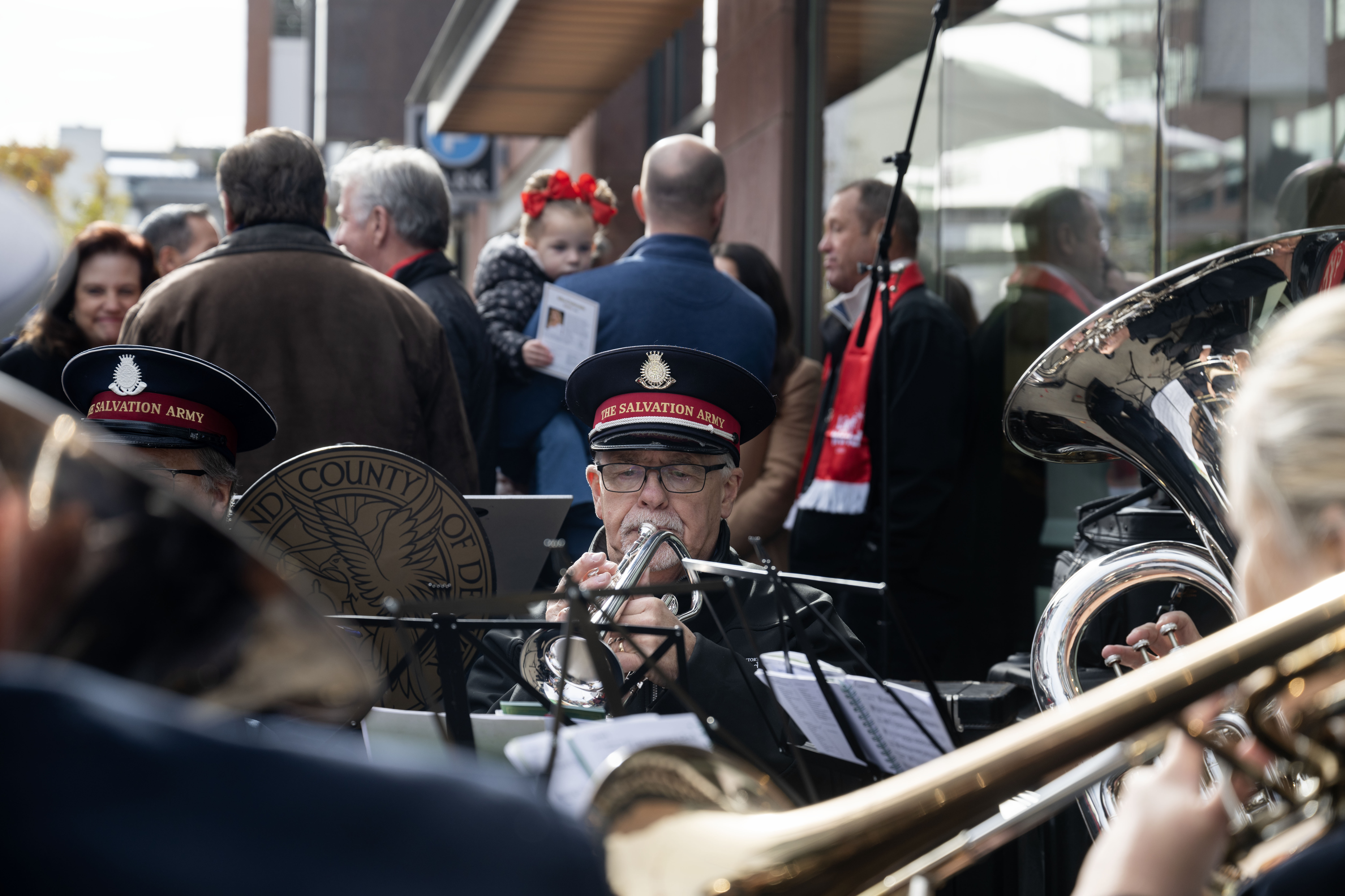 The Salvation Army brass band performs during an unwrapping event for Giving Machines in Cherry Creek North on Thursday, Nov. 21, 2024. The giving machines are customized vending machines that allow you to donate directly to one of five local/Denver-metro charities or two global charities. (Stephen Swofford, Denver Gazette) (StephenSwoffordPhotographerstephen.swofford@gazette.comhttps://secure.gravatar.com/avatar/1ddcaf11c5d70eaa58546ddc4e038687?d=mm&r=g)