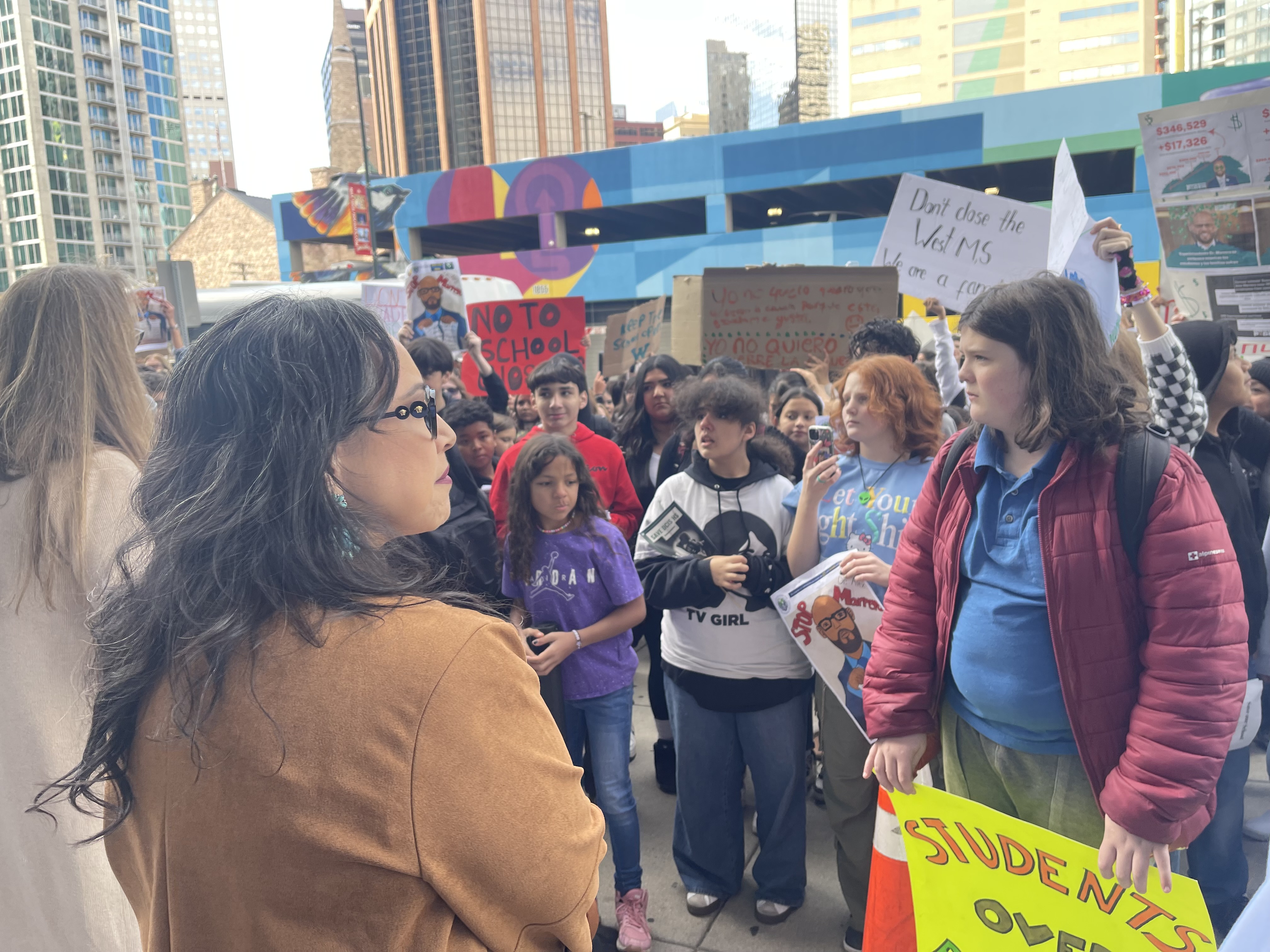DPS board president Carrie Olson and Xochil Gaytan meet student protesters in front of DPS school headquarters on Friday, Nov. 15, 2024. (Nico Brambila, The Denver Gazette)