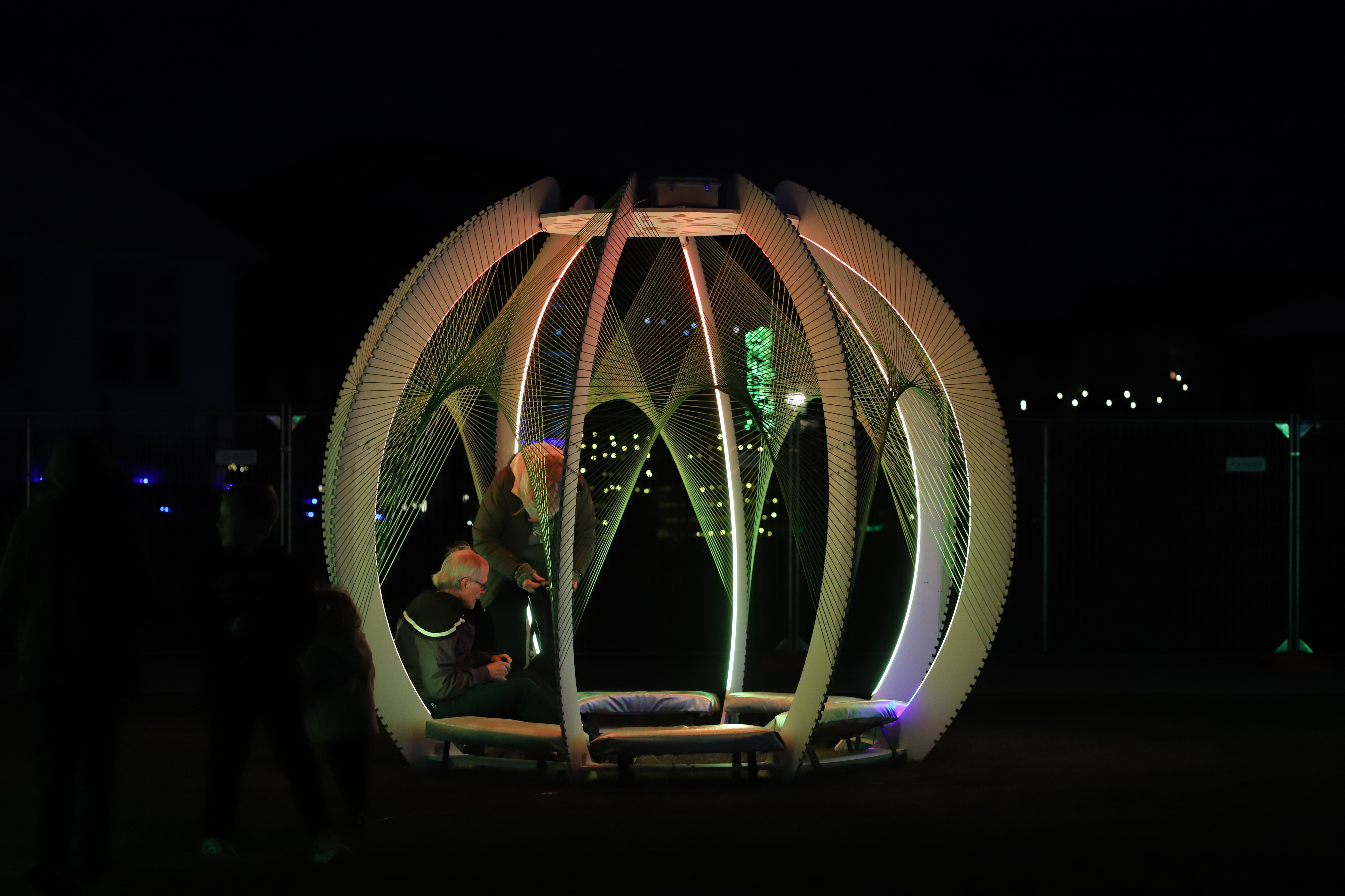 People explore the inside of an illuminated orb at the Aurora Borealis Festival on Nov. 1, 2024. (KylaPearceAurora reporterkyla.pearce@denvergazette.comhttps://denvergazette.com/content/tncms/avatars/2/16/1e5/2161e54a-3f47-11ed-bc0c-ff41892600ae.4fb8f678b9b96eab286c33c5af828fe7.png)