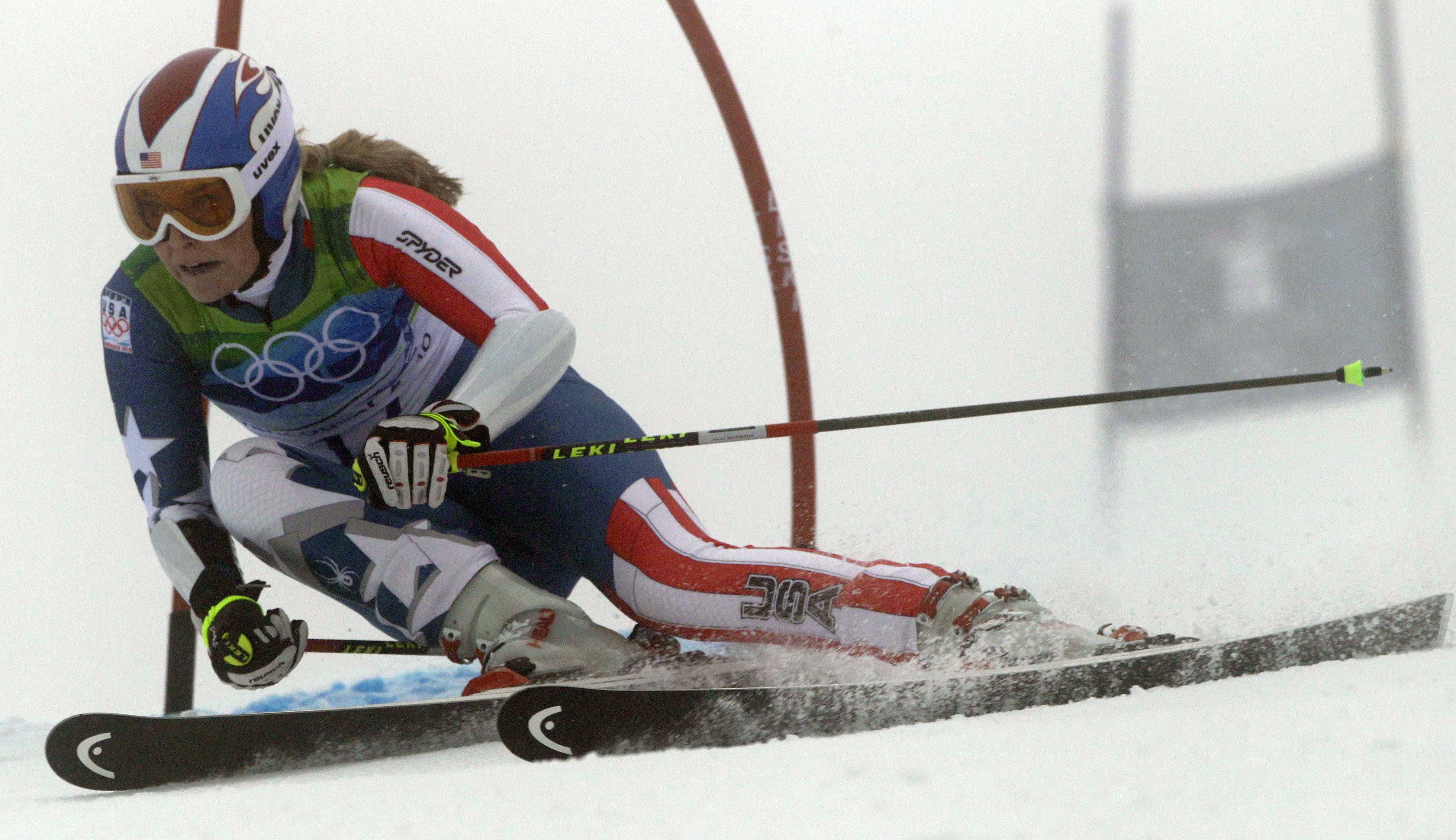 Lindsey Vonn of the United States passes a gate during the first run of the Women's giant slalom, at the Vancouver 2010 Olympics in Whistler, British Columbia, Canada, Wednesday, Feb. 24, 2010. (The Associated Press)