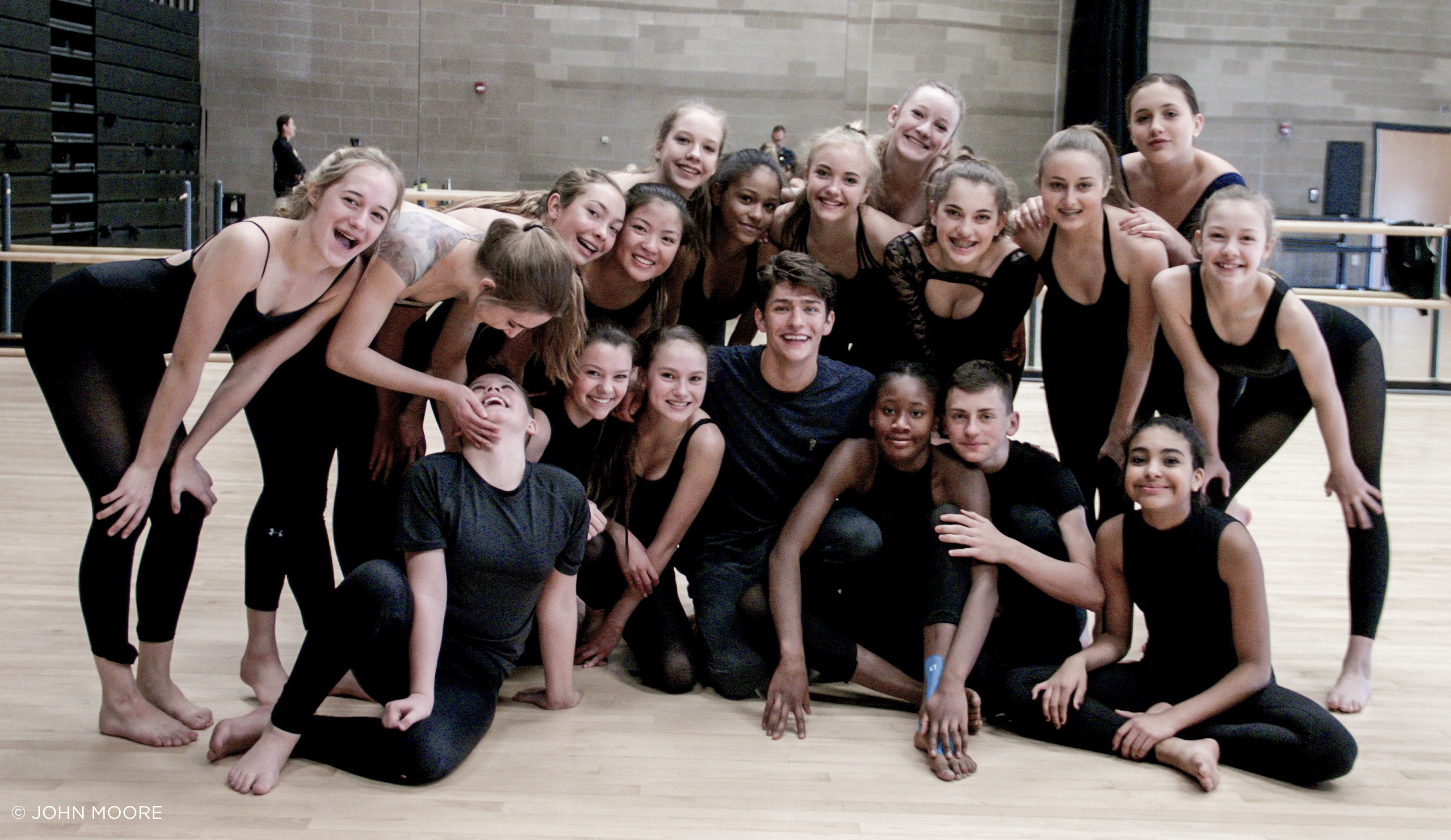 Barton Cowperthwaite poses with students from Denver School of the Arts after leading them through a master class when he returned to Denver – and his alma mater – with the national touring production of 