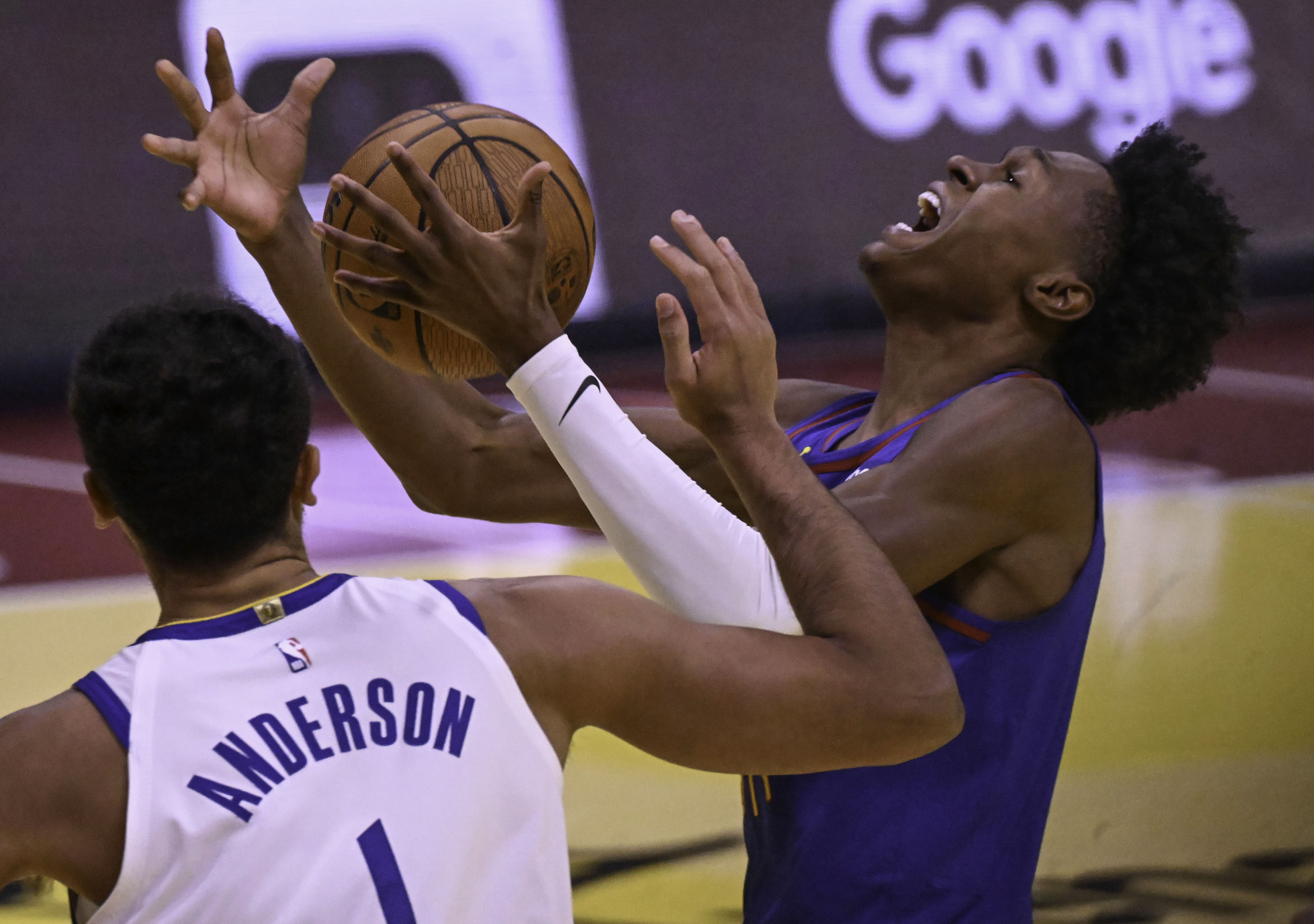 Denver Nuggets forward Peyton Watson (8) goes up for a shot while being defended by Golden State Warriors forward Kyle Anderson (1) during the third quarter of an Emirates NBA Cup Group Play game at Ball Arena on Tuesday, Dec. 3, 2024. (Jerilee Bennett, The Gazette)