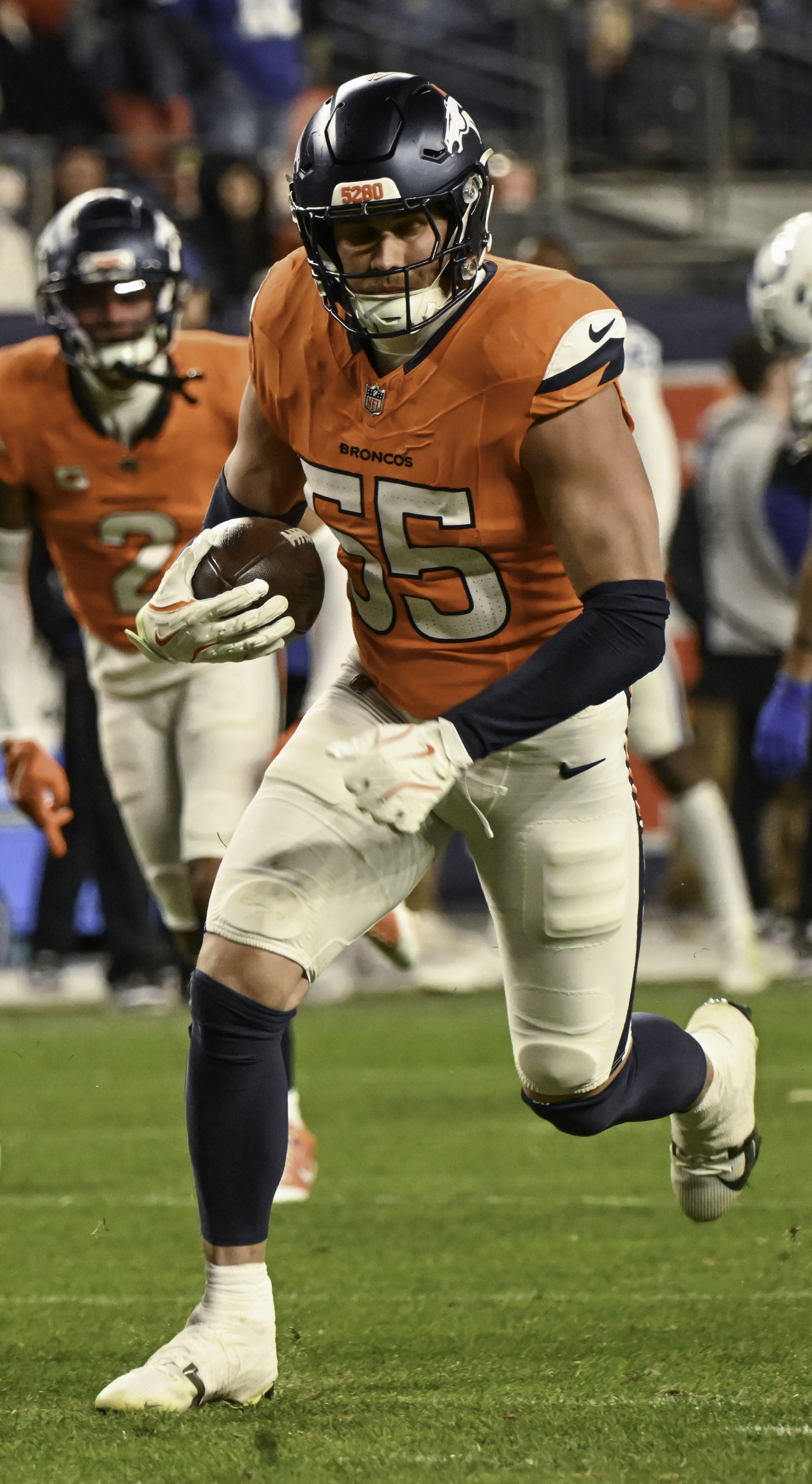 Denver Broncos linebacker Cody Barton (55) runs with the ball with what he thought might be a fumbled ball during a game against the Colts on Sunday, Dec. 15, 2024. (Jerilee Bennett,The Gazette)