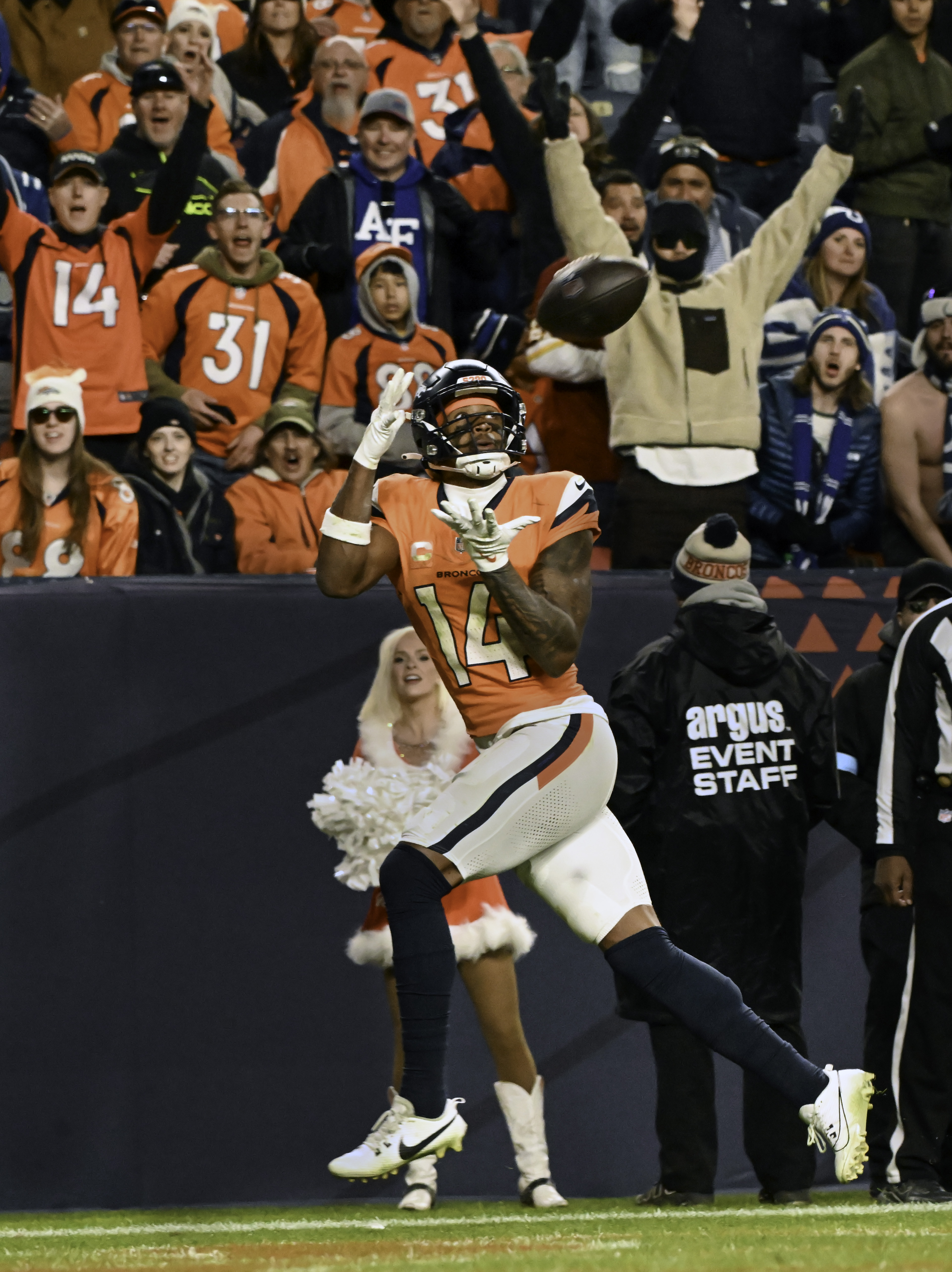 Denver Broncos wide receiver Courtland Sutton (14) catches a touchdown pass during the second half of a game against the Colts. The Broncos defeated the Colts 31-13 at Empower Field at Mile High on Sunday, Dec. 15, 2024. (Jerilee Bennett,The Gazette)