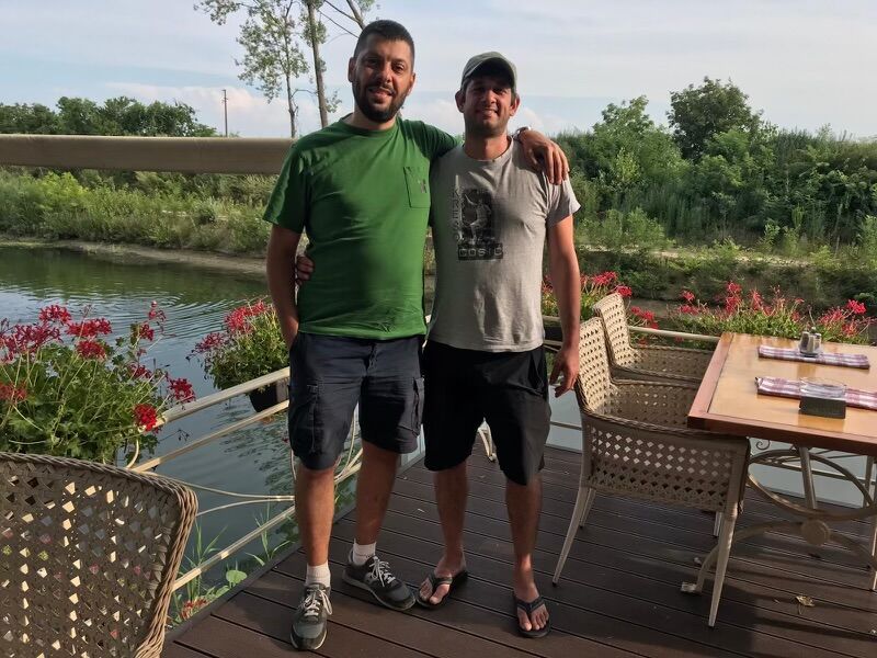 Mike Singer (right) and Marko Llubomirovic pose for a picture in Sombor.  Llubomirovic helped Singer as a driver, translator and connector during Singer's trip to Serbia. (Photo courtesy of Mike Singer)
