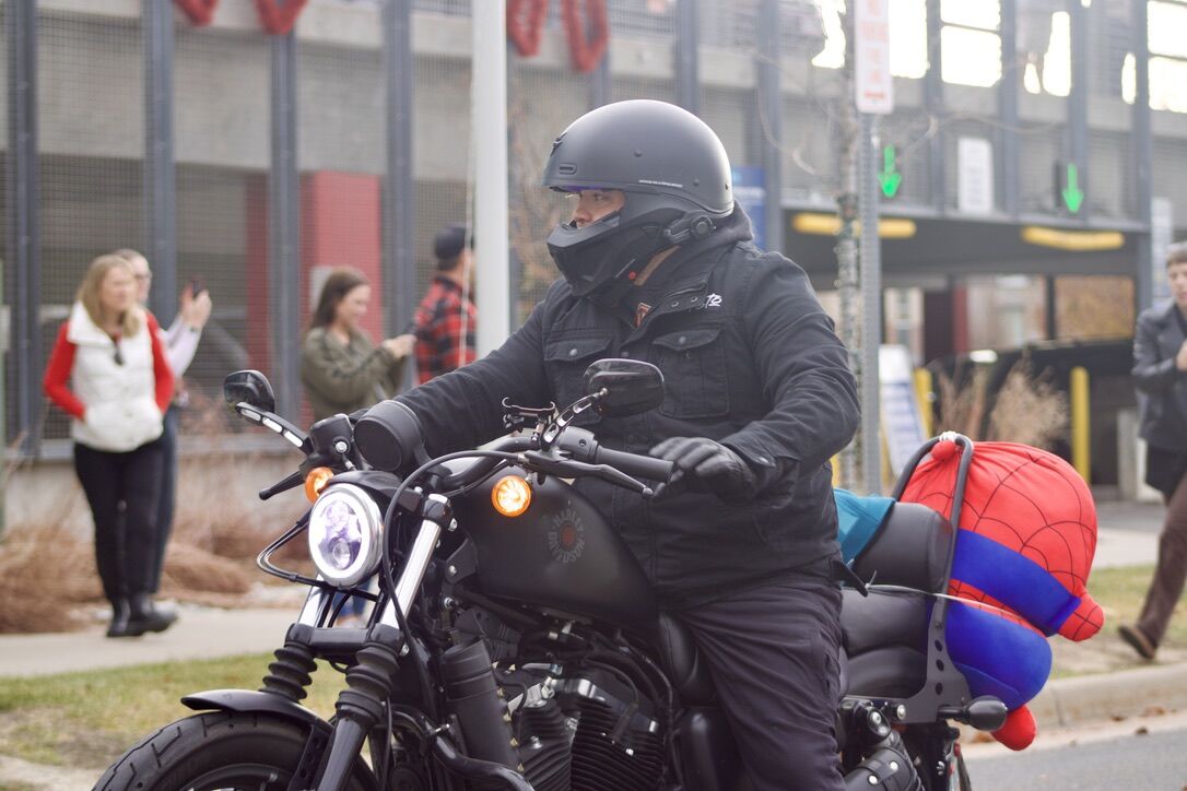 A Harley Davidson motorcycle rider, with a Spider-Man plush toy riding in the backseat, rolls into the parking lot of Children's Hospital Colorado during the 39th annual Harley Toy Run outside the hospital on Sunday, Dec. 8 in Aurora, Colorado. (NoahFestensteinCity Government Reporternoah.festenstein@denvergazette.comhttps://denvergazette.com/content/tncms/avatars/9/f0/326/9f032698-379f-11ee-8053-8bacbed4931f.60984dba383441d9647e0e740a08a8e6.png)