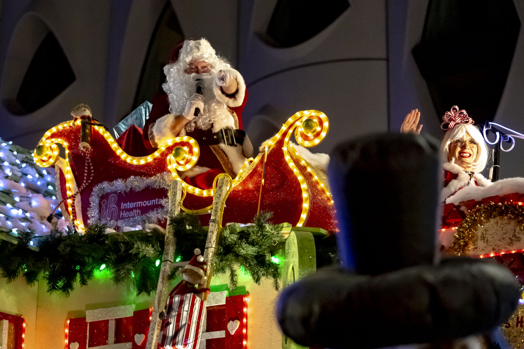 Santa Claus and Mrs. Claus greet guests who came to celebrate in front of the Denver City Council building on Bannock Street in Denver on Saturday, Dec. 7, 2024 during the 9NEWS 50th Anniversary Parade of Lights. (Laura Domingue/Special to the Gazette) (LAURA DOMINGUE/Special to The Denver Gazette)
