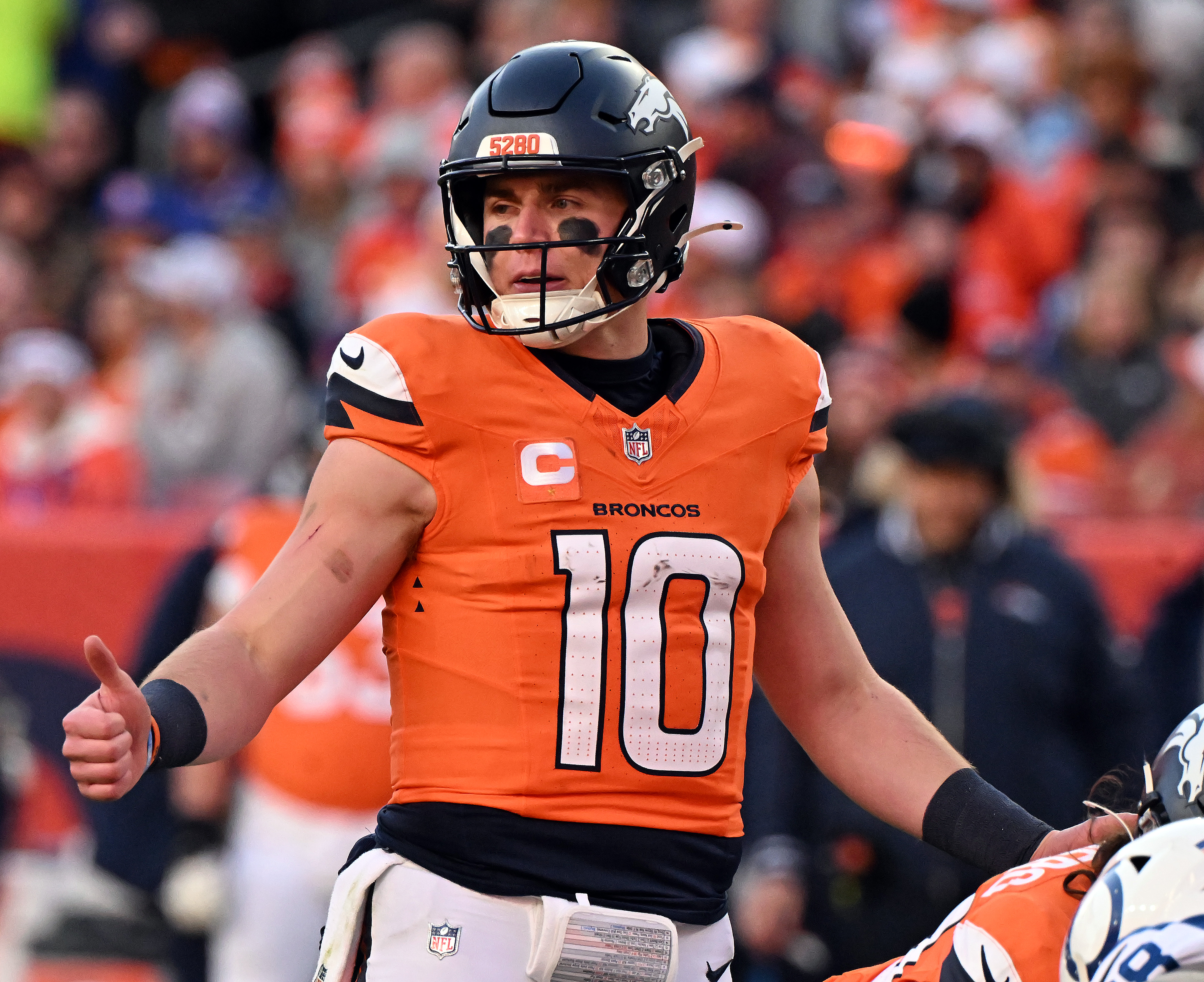 Denver Broncos quarterback Bo Nix (10) gives an audible during the second quarter of a game against the Colts.The Broncos defeated the Colts 31-13 at Empower Field at Mile High on Sunday, Dec. 15, 2024. (Jerilee Bennett,The Gazette)