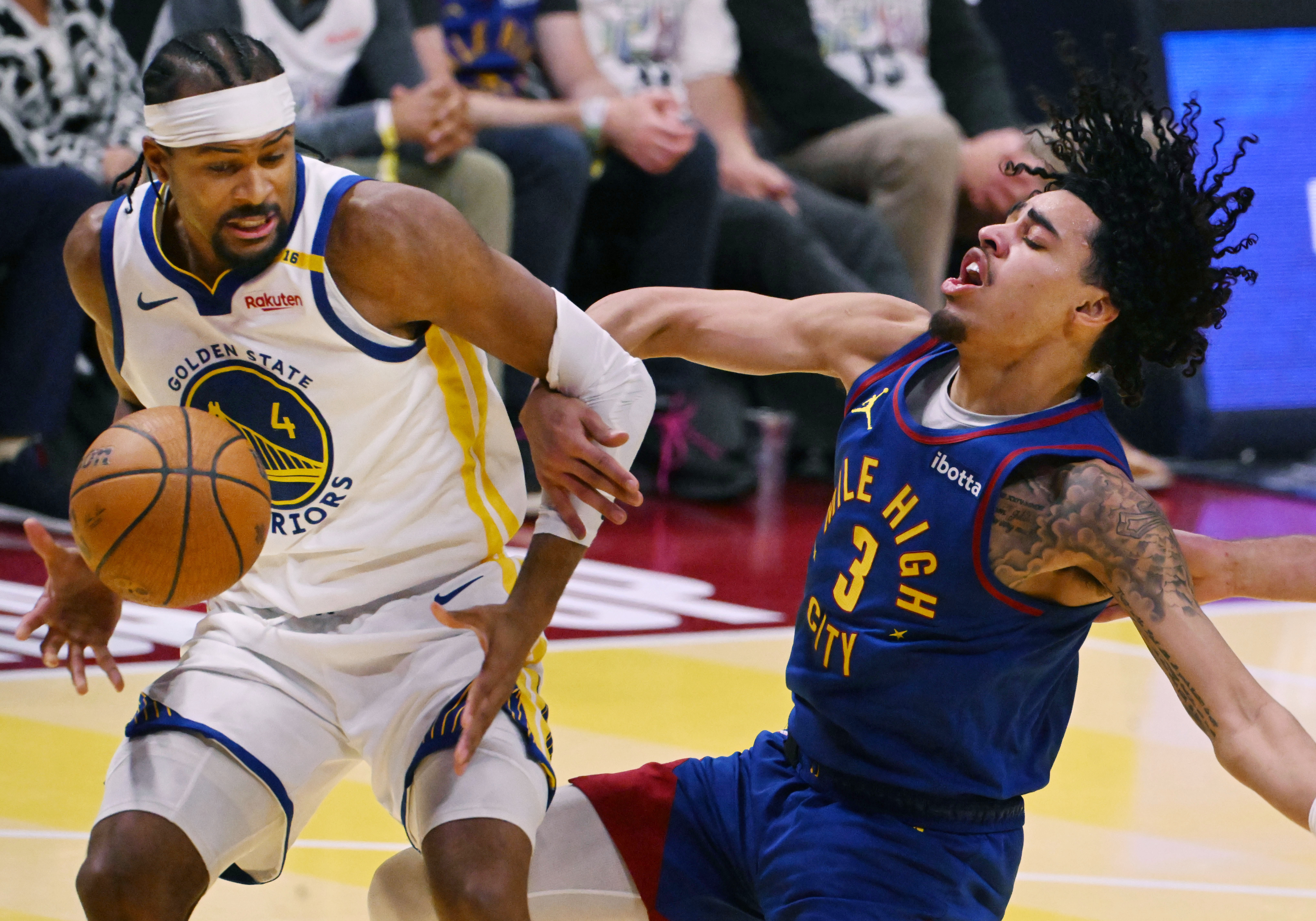 Denver Nuggets guard Julian Strawther (3) defends Golden State Warriors guard Moses Moody (4) during an Emirates NBA Cup Group Play game at Ball Arena on Tuesday, Dec. 3, 2024. The Nuggets defeated the Warriors 119-115. (Jerilee Bennett, The Gazette)